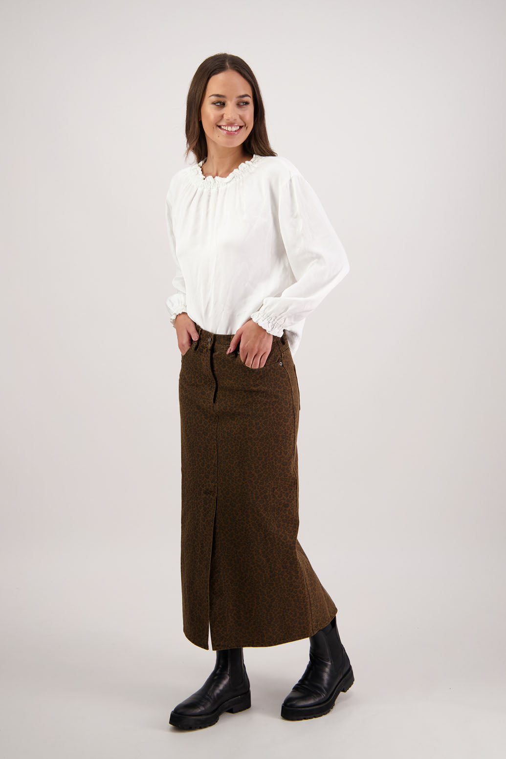 Rebel Denim Skirt in Tan Animal by Briarwood NZ. 100% cotton denim button through skirt, slight A-line, front pockets, stitched down panels