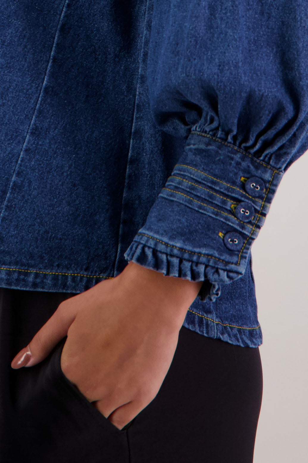 Redmond Denim Top by Briarwood NZ. 100% cotton top with pin tucks, shaped collar with ruffle and tie, full length sleeves with pin tucks on buttoned cuff