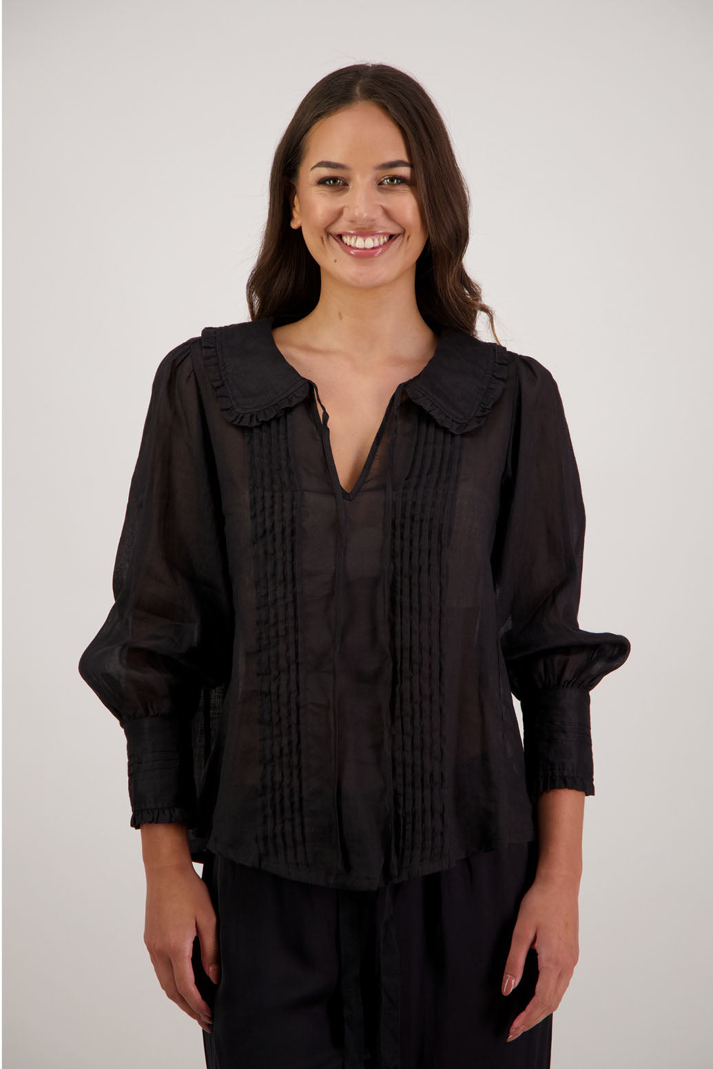 Richie Black Top by Briarwood NZ. 100% ramie top with shaped ruffle collar and tie detail. Designed in New Zealand.