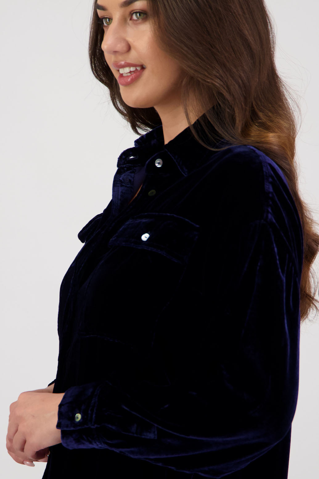 Ridge Shirt in Ink Velvet by Briarwood NZ. A  18% Silk, 82% Rayon Velvet collared button through shirt with full length sleeves, longer at the back, side splits, pockets on front
