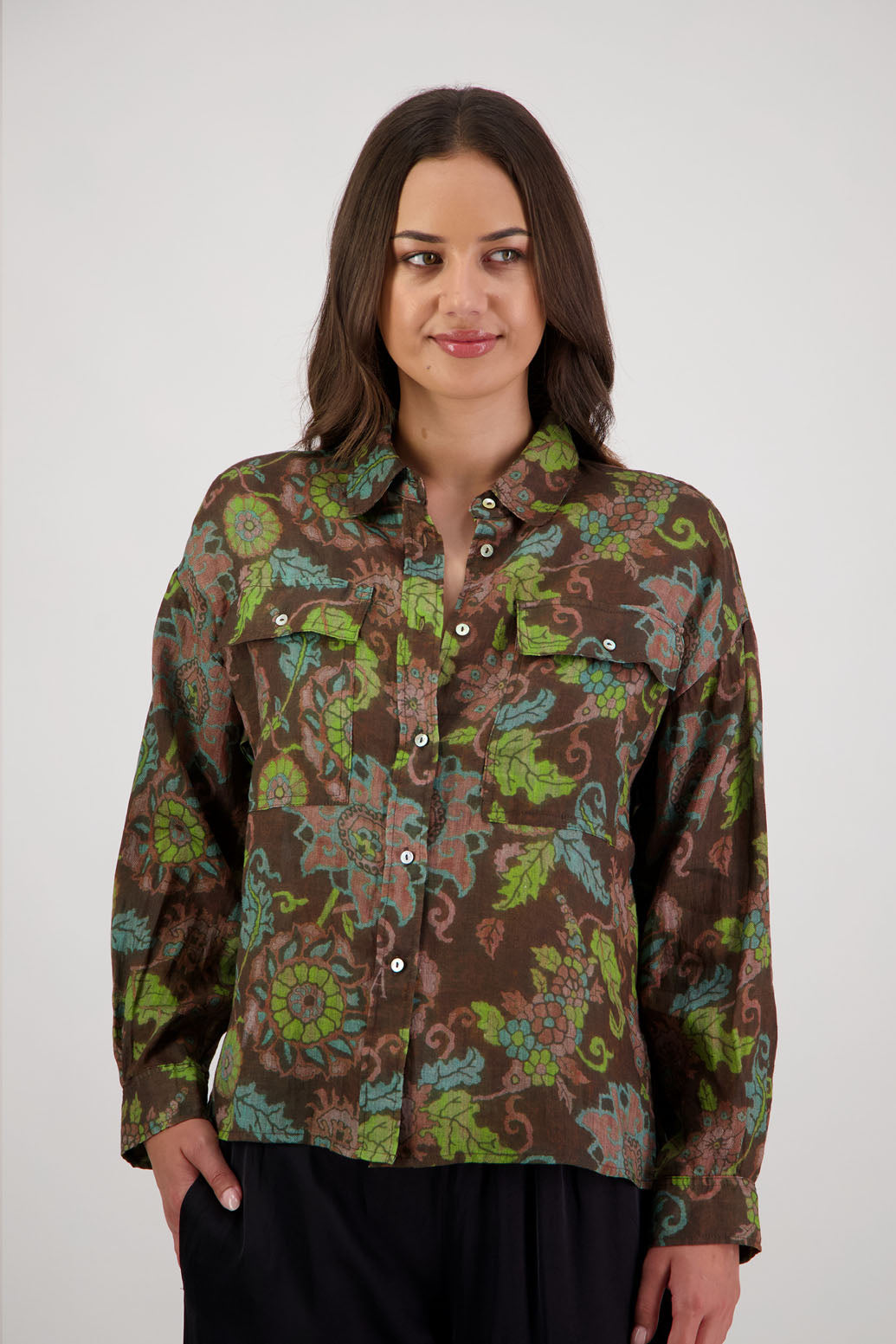 Ripley Shirt in Brown Floral by Briarwood NZ. 100% Ramie collared button through shirt, full length sleeves, longer at the back, side splits, pockets on the front