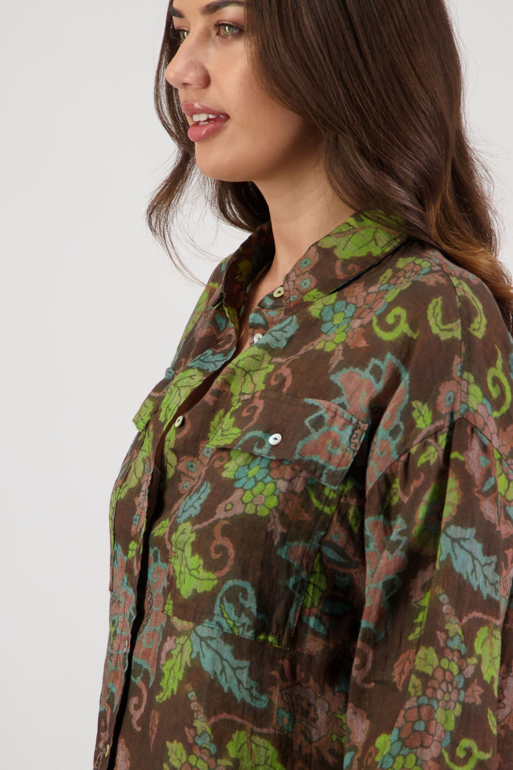 Ripley Shirt in Brown Floral by Briarwood NZ. 100% Ramie collared button through shirt, full length sleeves, longer at the back, side splits, pockets on the front
