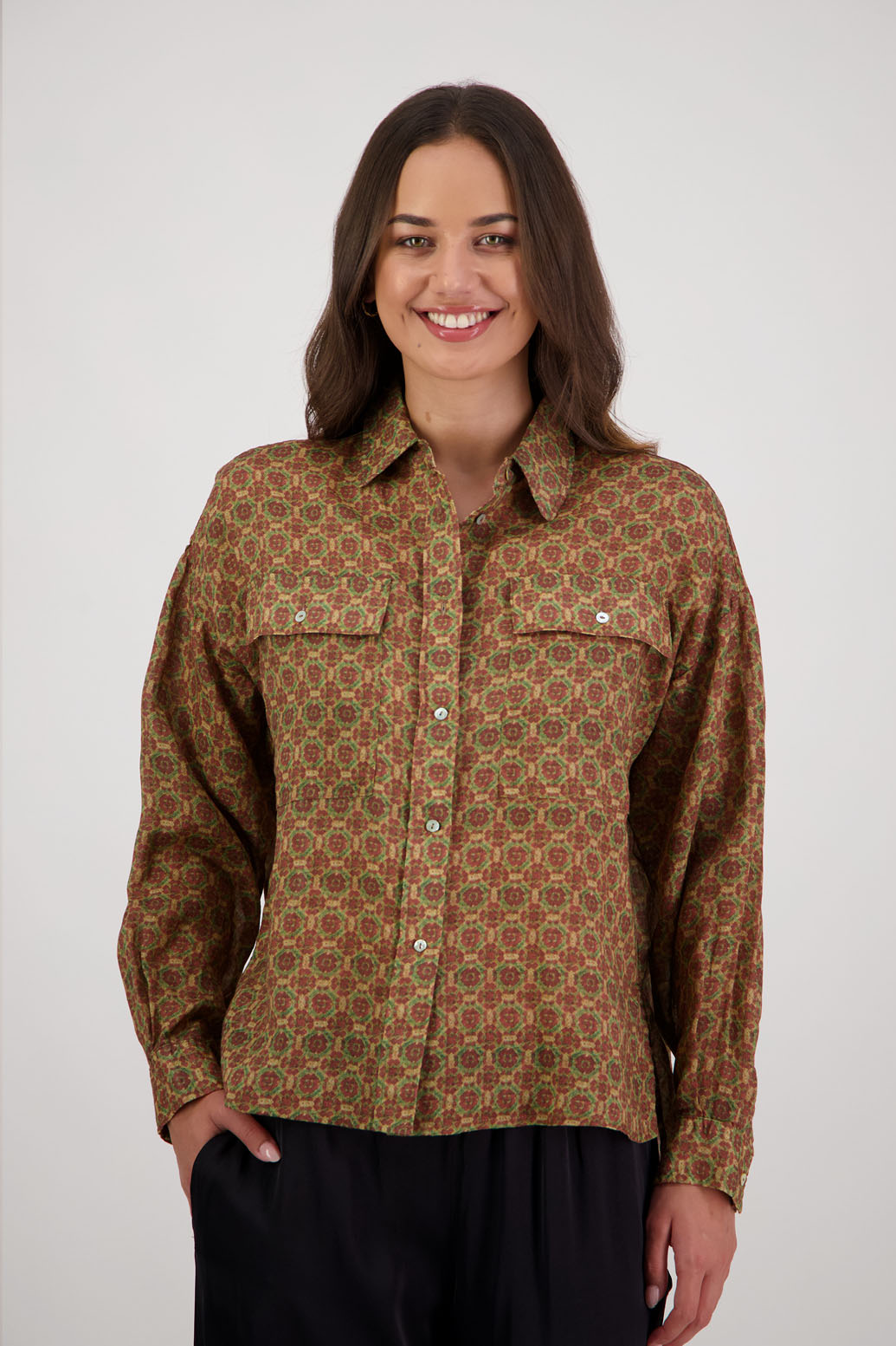 Ripley Shirt in Camel Tile by Briarwood NZ. 100% Ramie collared button through shirt, full length sleeves, longer at the back, side splits, pockets on the front