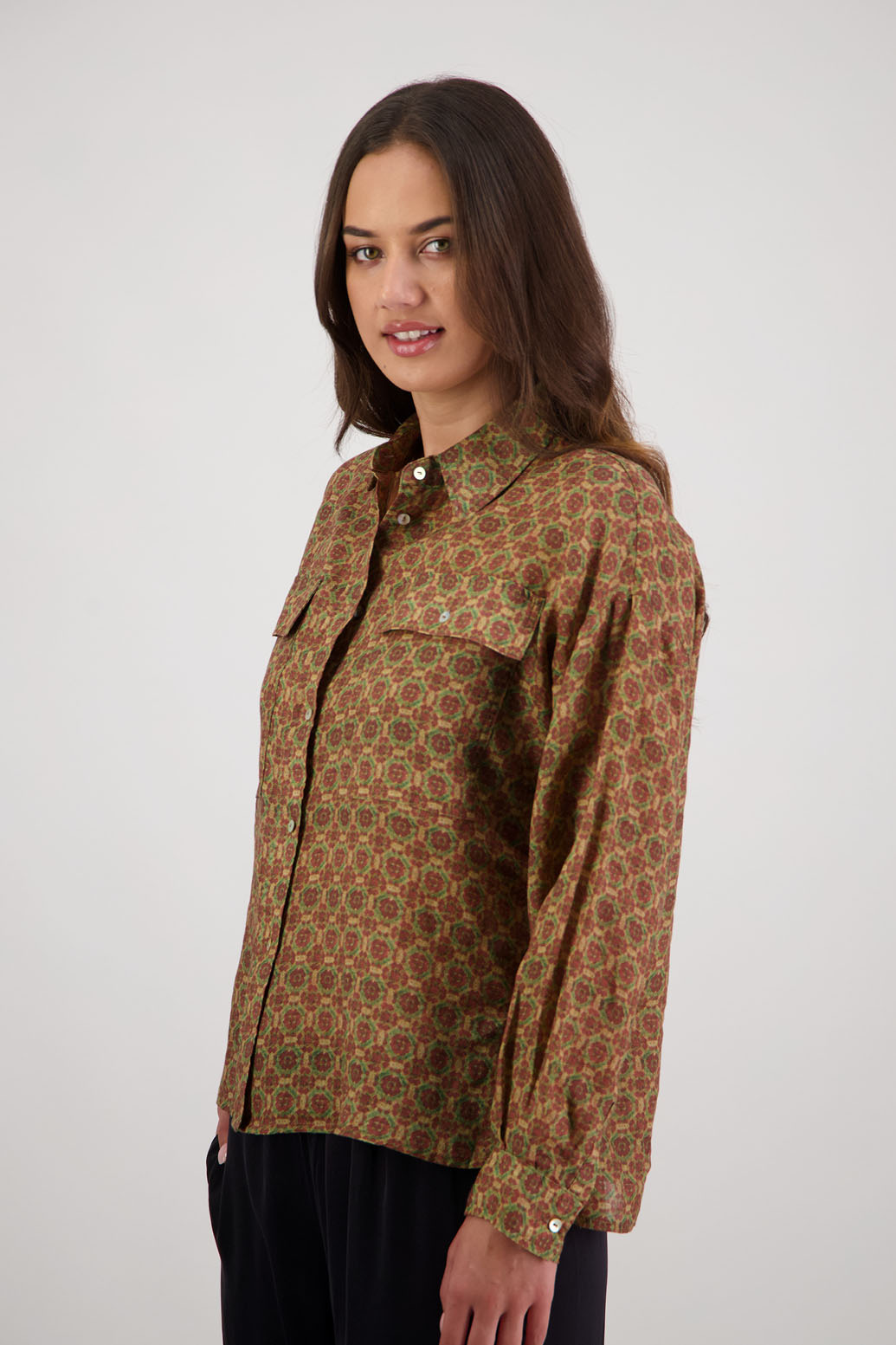 Ripley Shirt in Camel Tile by Briarwood NZ. 100% Ramie collared button through shirt, full length sleeves, longer at the back, side splits, pockets on the front