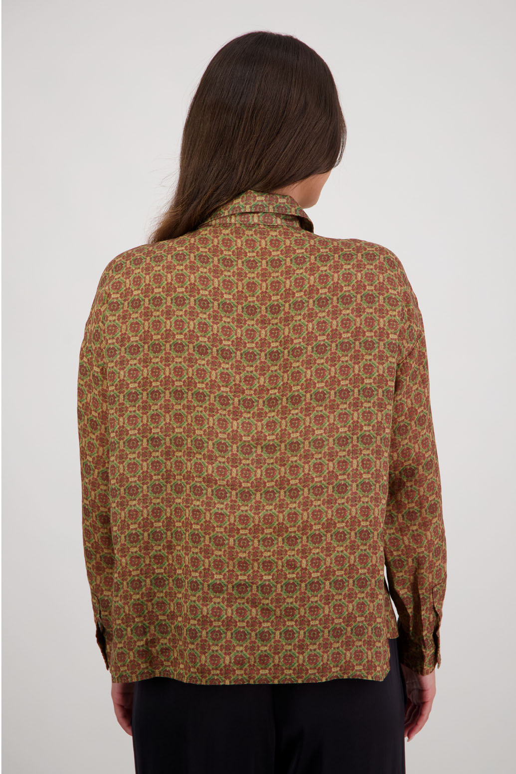Ripley Shirt in Camel Tile by Briarwood NZ. 100% Ramie collared button through shirt, full length sleeves, longer at the back, side splits, pockets on the front