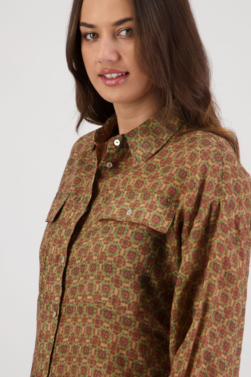 Ripley Shirt in Camel Tile by Briarwood NZ. 100% Ramie collared button through shirt, full length sleeves, longer at the back, side splits, pockets on the front