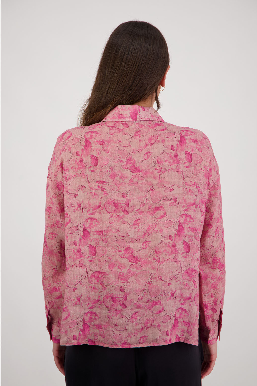 Ripley Shirt in Pink Floral by Briarwood NZ. 100% Ramie collared button through shirt, full length sleeves, longer at the back, side splits, pockets on the front