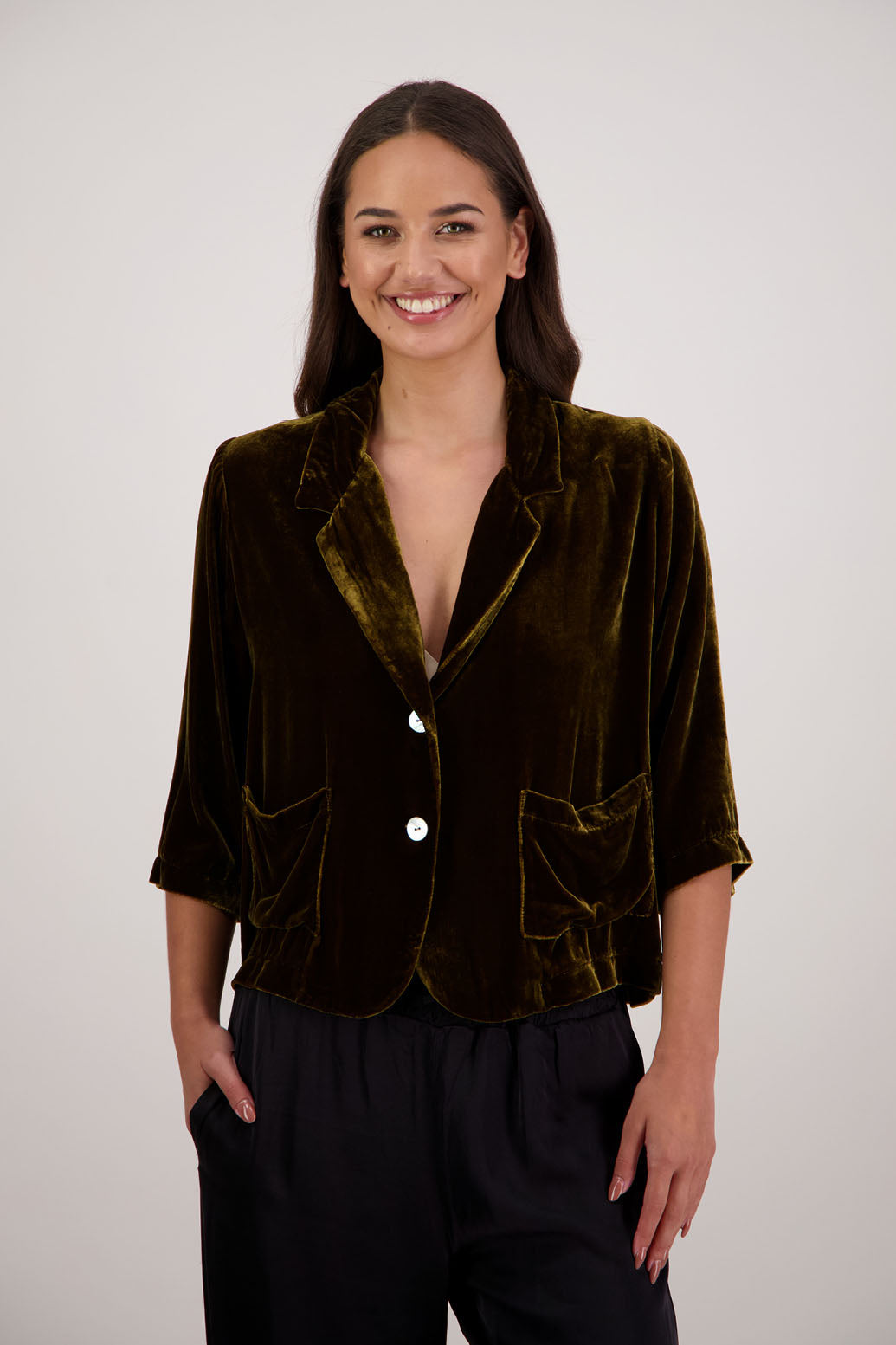 Rita Jacket in Tan Velvet by Briarwood NZ. A  18% Silk, 82% Rayon Velvet Jacket with 3/4 length sleeves, soft collar, double button closure, soft pockets, back split