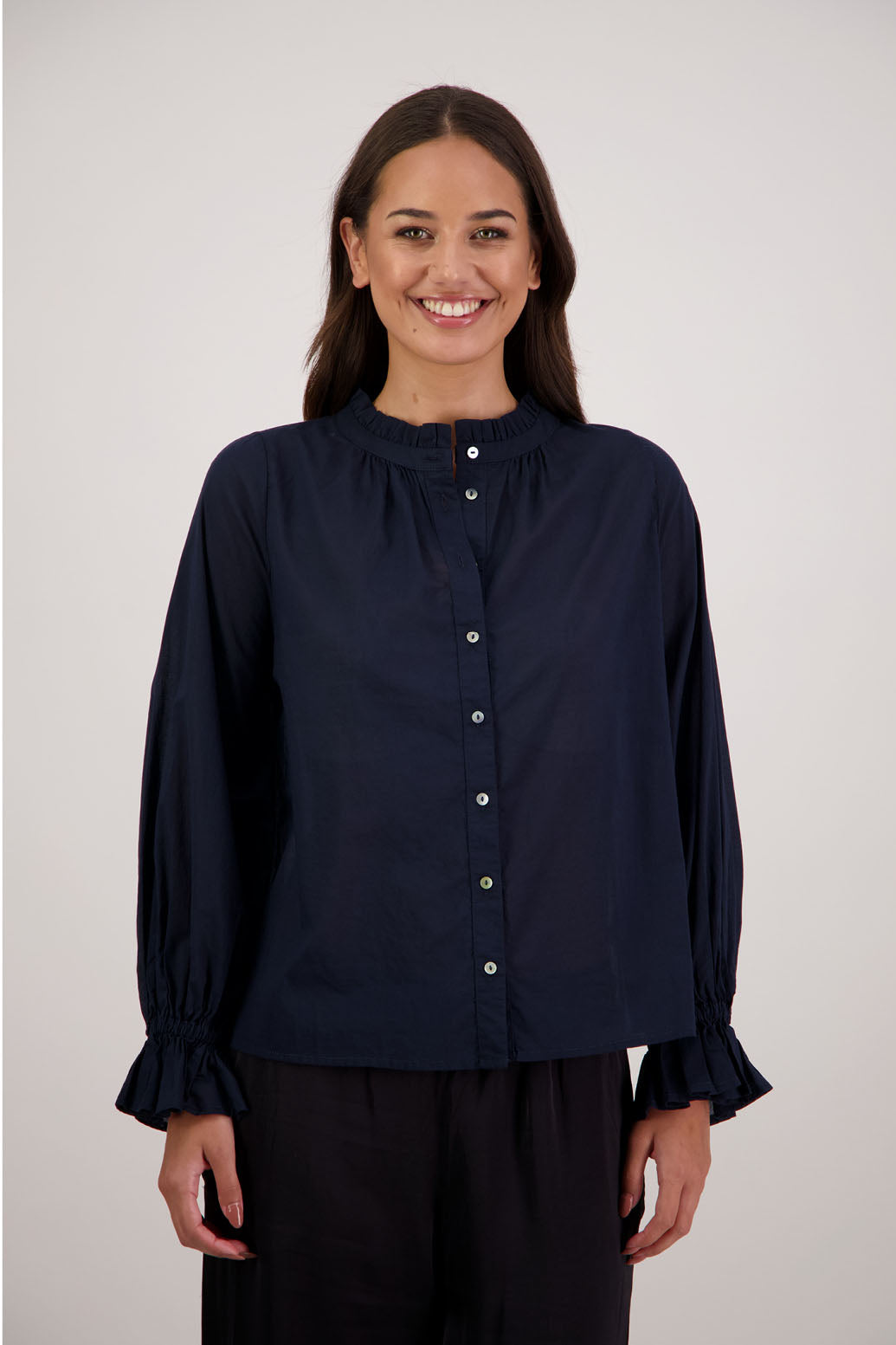Briarwood NZ. Ink/Dark Blue  long sleeve shirt, Elasticated sleeves, Ruffles around neck, Buttoned through