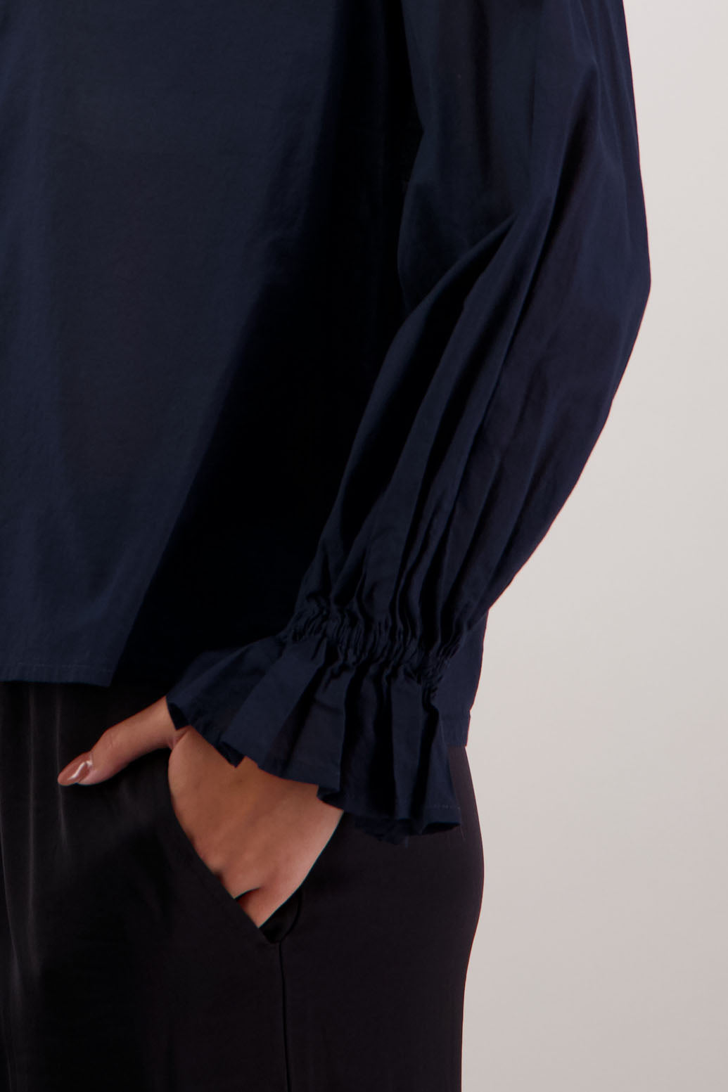 Briarwood NZ. Ink/Dark Blue  long sleeve shirt, Elasticated sleeves, Ruffles around neck, Buttoned through