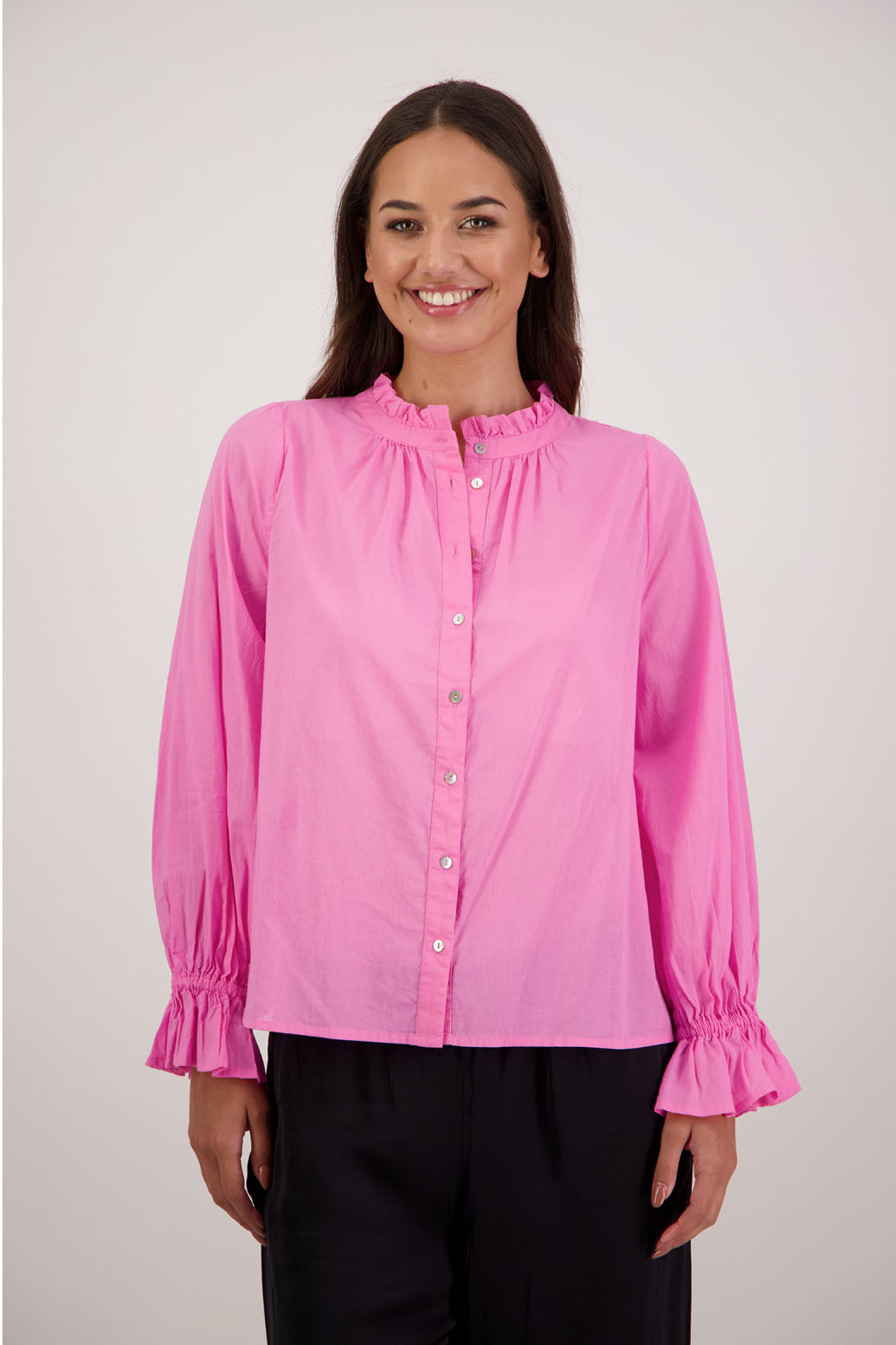 Briarwood NZ. Pink  long sleeve shirt, Elasticated sleeves, Ruffles around neck, Buttoned through