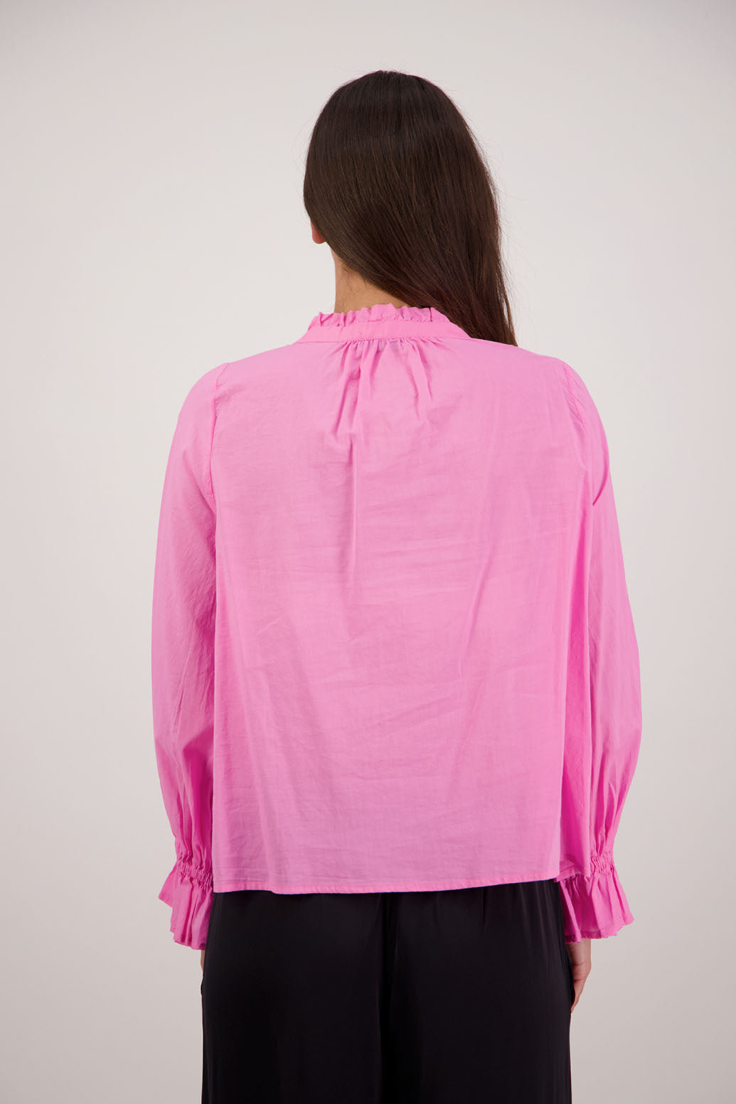 Briarwood NZ. Pink  long sleeve shirt, Elasticated sleeves, Ruffles around neck, Buttoned through