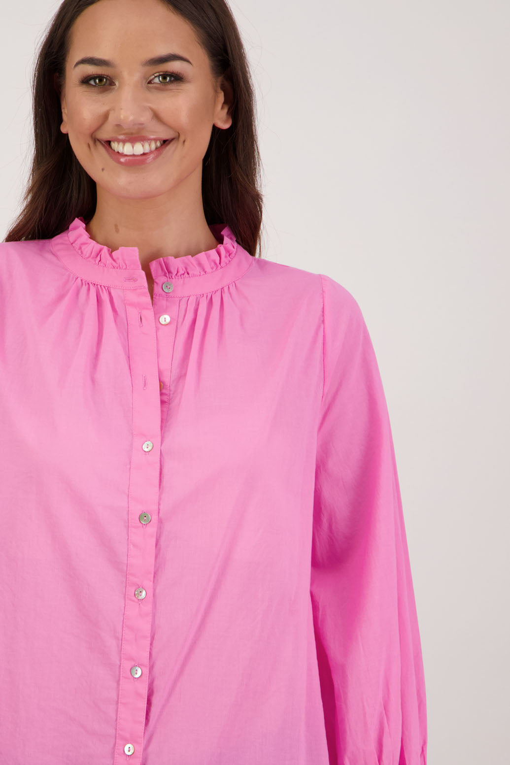 Briarwood NZ. Pink  long sleeve shirt, Elasticated sleeves, Ruffles around neck, Buttoned through