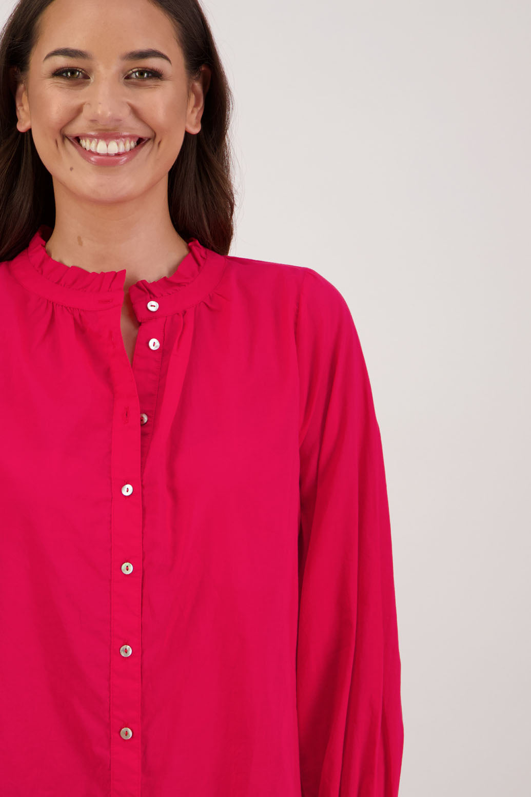 Briarwood NZ.Red  long sleeve shirt, Elasticated sleeves, Ruffles around neck, Buttoned through