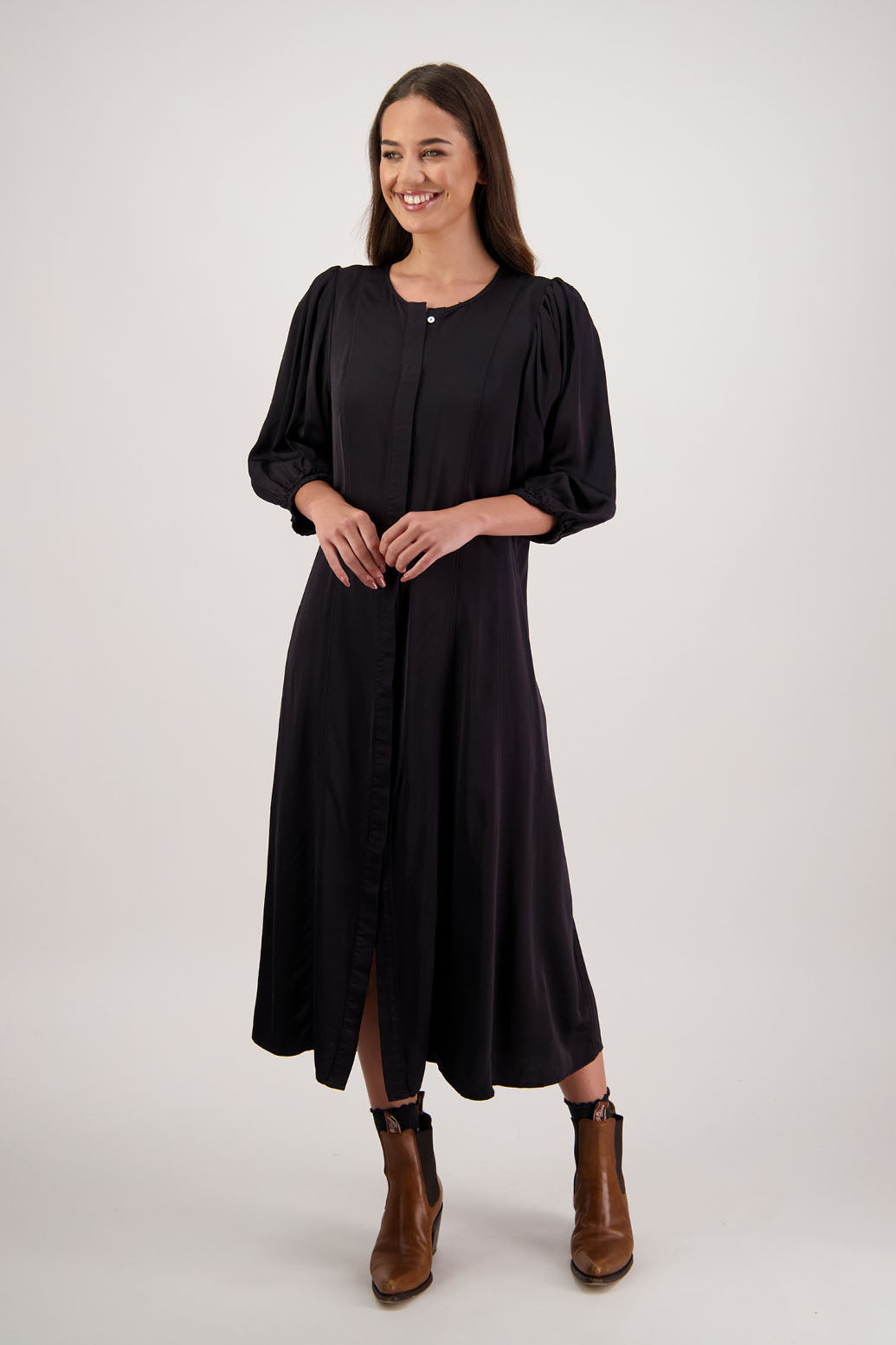 Romy Dress in Black by Briarwood NZ. 100% viscose dress, button through full length, 3/4 length sleeves, stitched shaped panels front & back, no collar