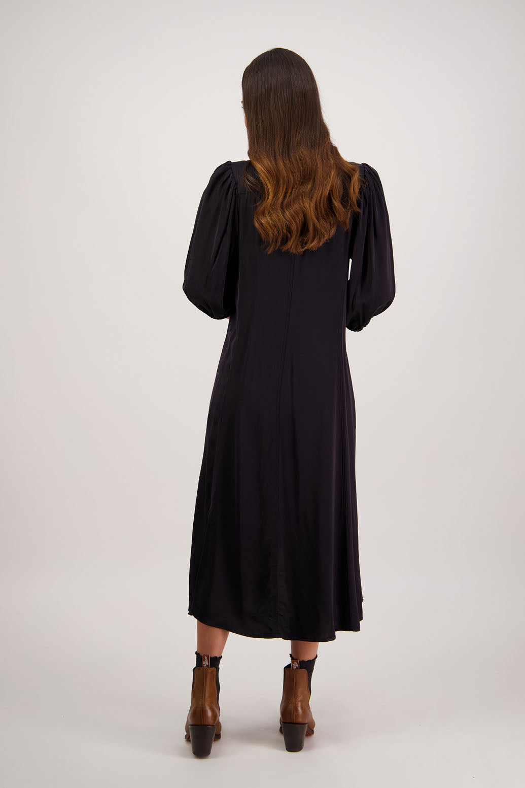 Romy Dress in Black by Briarwood NZ. 100% viscose dress, button through full length, 3/4 length sleeves, stitched shaped panels front & back, no collar