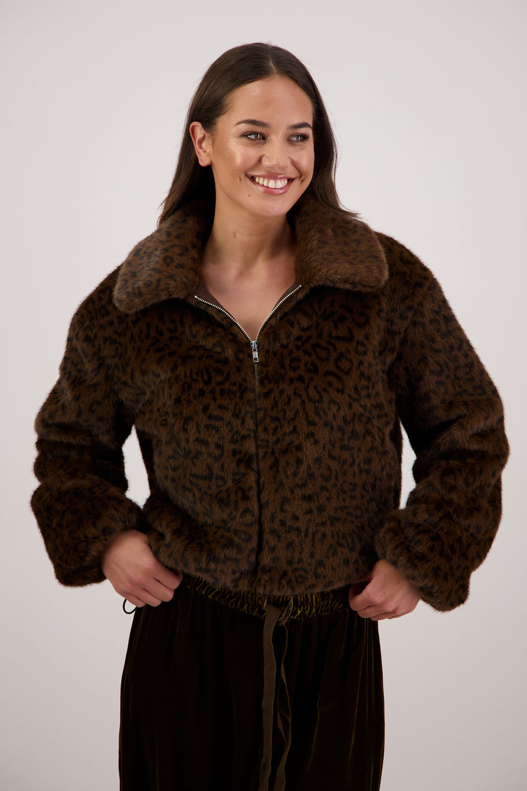 Roper Jacket in Animal by Briarwood NZ. A  100% Polyester Jacket with slight bomber shape, elasticated pull around waist with toggles, elasticated sleeves, zip closure, collar
