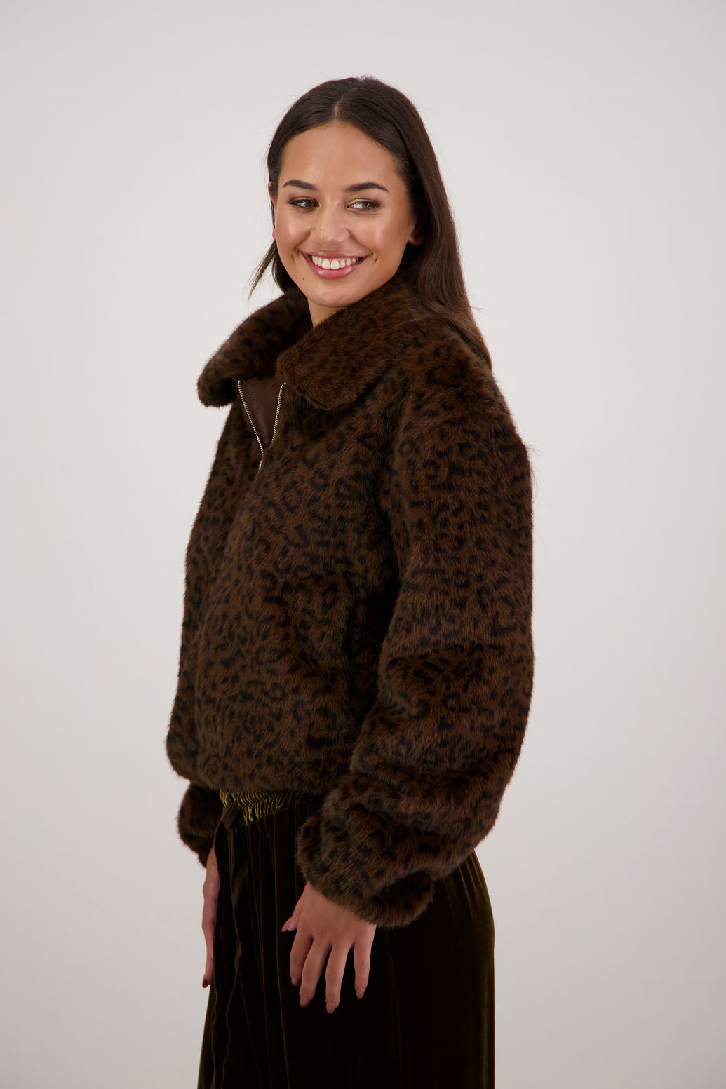 Roper Jacket in Animal by Briarwood NZ. A  100% Polyester Jacket with slight bomber shape, elasticated pull around waist with toggles, elasticated sleeves, zip closure, collar