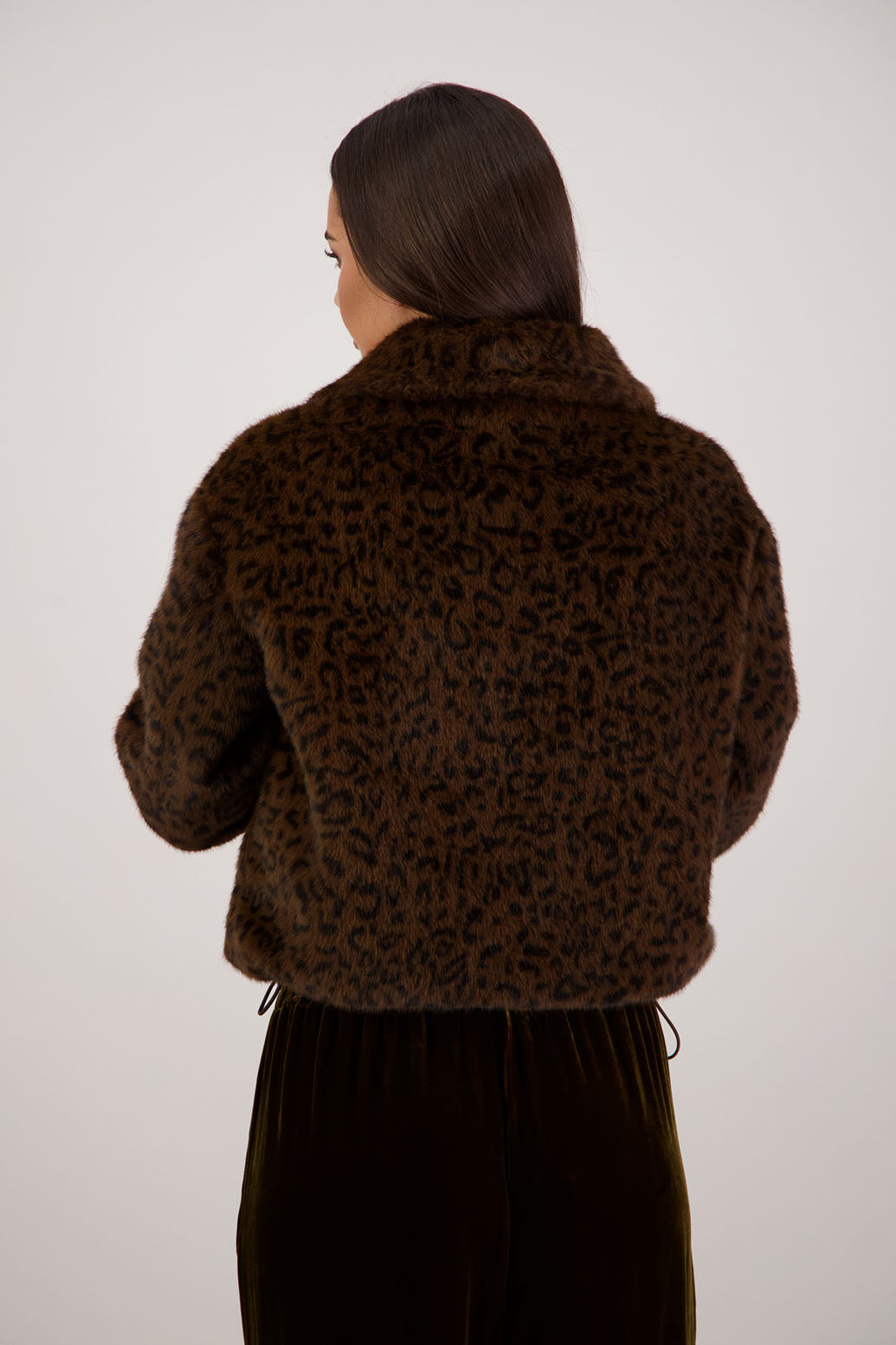 Roper Jacket in Animal by Briarwood NZ. A  100% Polyester Jacket with slight bomber shape, elasticated pull around waist with toggles, elasticated sleeves, zip closure, collar
