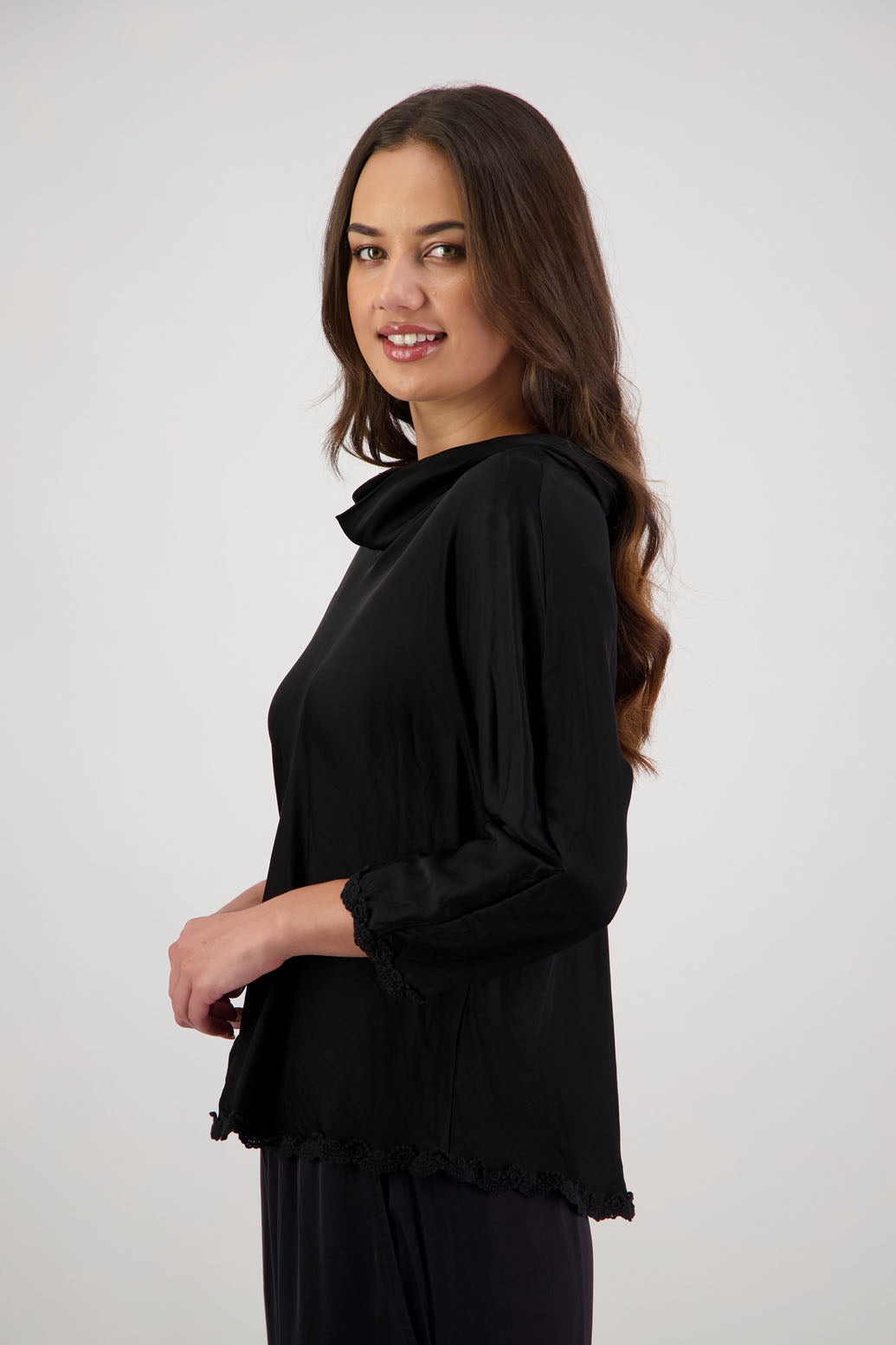 Rosanna Top in Black by Briarwood NZ. 100% viscose topwith roll neck, 3/4 sleeves, bias cut, lace trim
