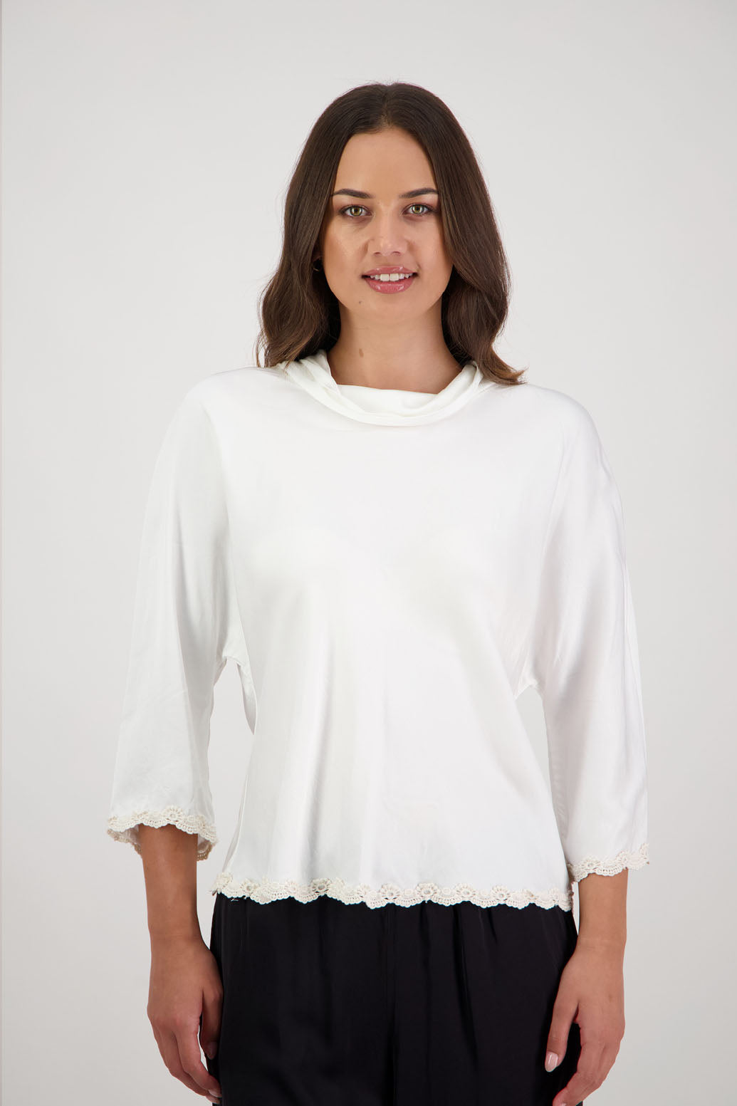 Rosanna Top in Ivory by Briarwood NZ. 100% viscose topwith roll neck, 3/4 sleeves, bias cut, lace trim