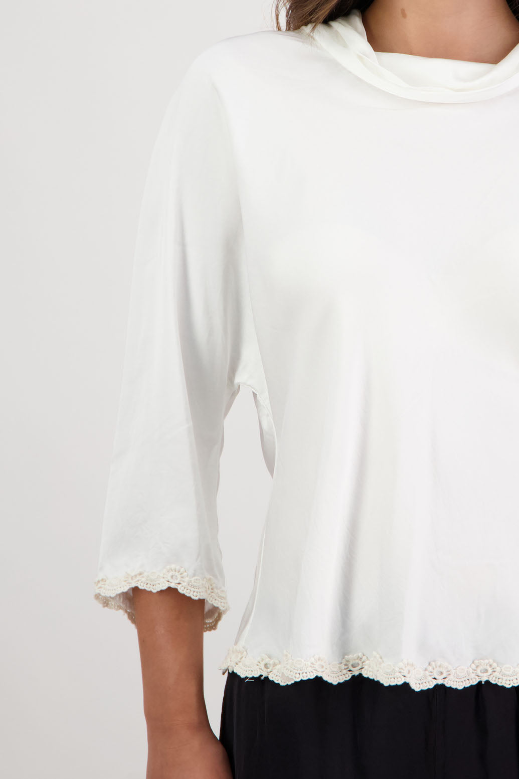 Rosanna Top in Ivory by Briarwood NZ. 100% viscose topwith roll neck, 3/4 sleeves, bias cut, lace trim