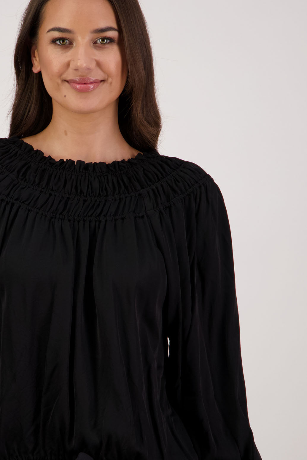 Rosemarie Top in Black by Briarwood NZ. 100% viscose top with 3 panel gathered neck, full length sleeves with ruffle, elasticated waistband
