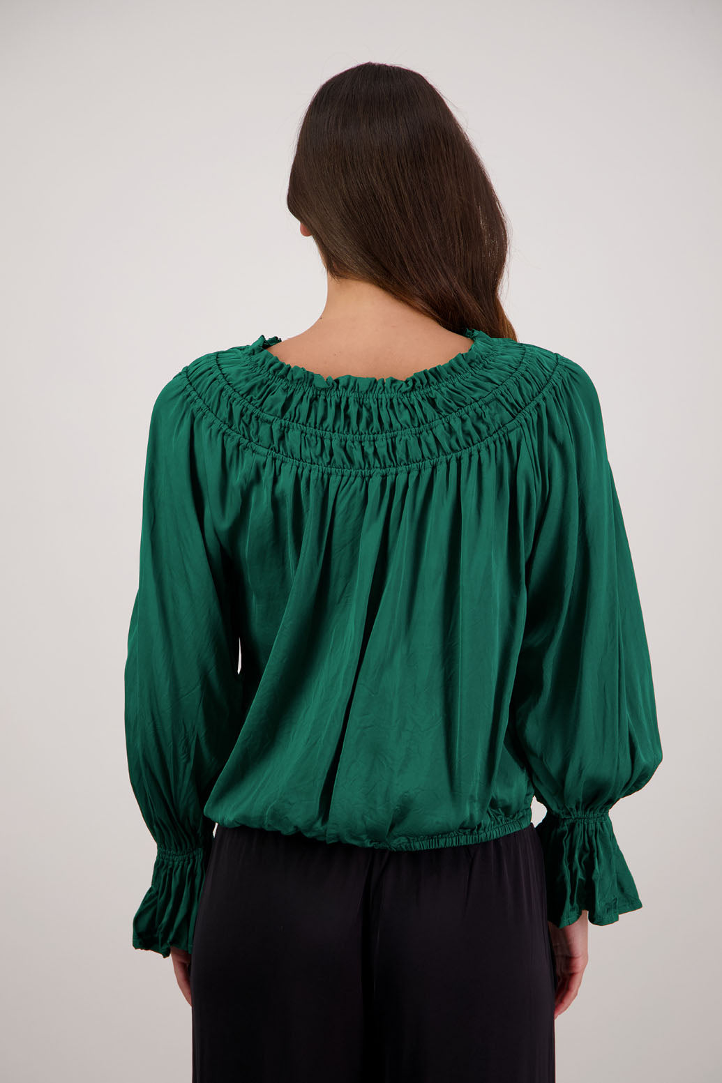 Rosemarie Top in Emerald by Briarwood NZ. 100% viscose top with 3 panel gathered neck, full length sleeves with ruffle, elasticated waistband