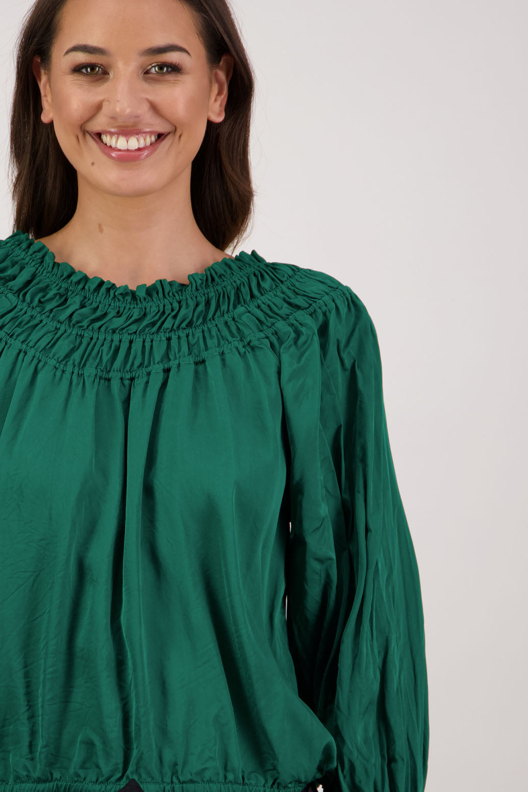 Rosemarie Top in Emerald by Briarwood NZ. 100% viscose top with 3 panel gathered neck, full length sleeves with ruffle, elasticated waistband