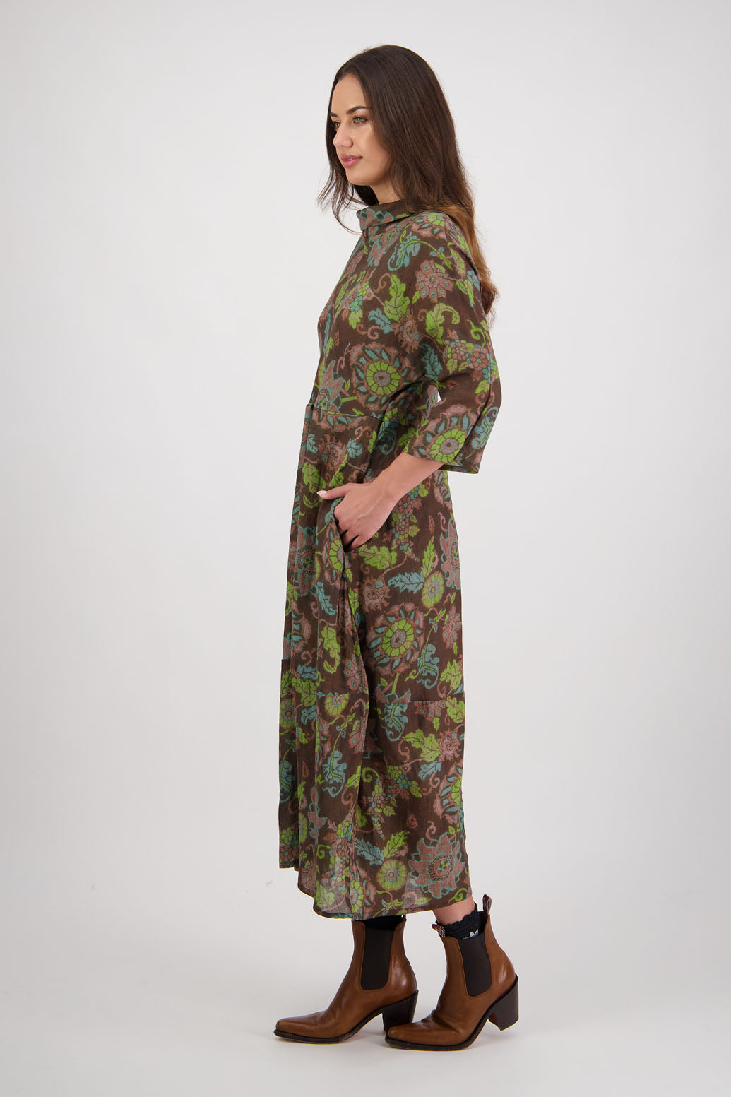 Rowena Dress in Brown Floral by Briarwood NZ. 100% Ramie dress, roll neck, bias cut top, puff hem start, 3/4 sleeves, pockets, lined