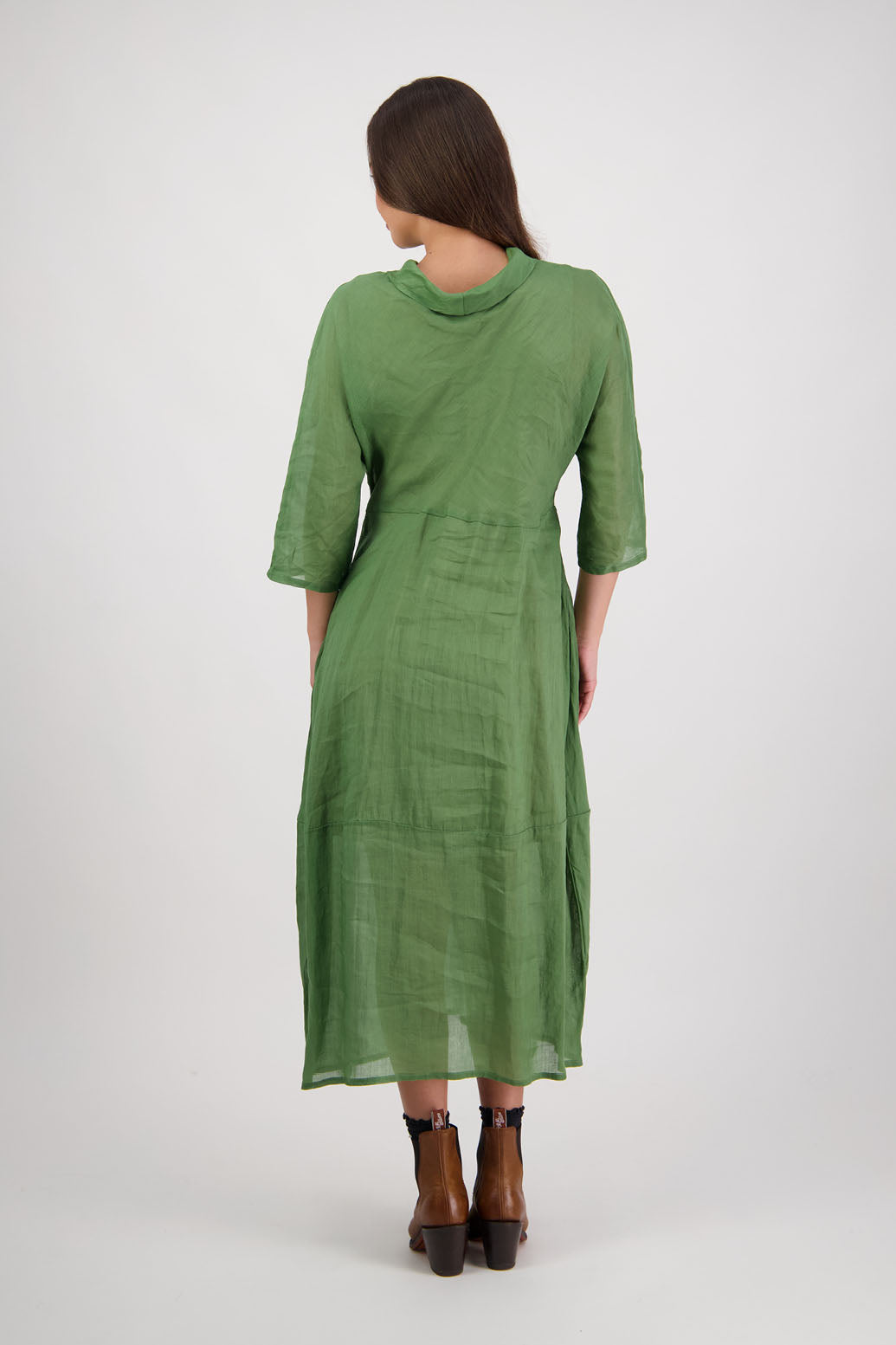 Rowena Dress in Grass by Briarwood NZ. 100% Ramie dress, roll neck, bias cut top, puff hem start, 3/4 sleeves, pockets, lined