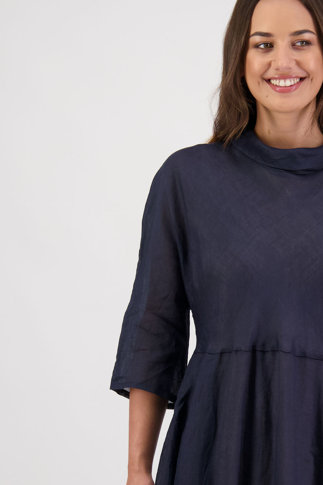 Rowena Dress in Ink by Briarwood NZ. 100% Ramie dress, roll neck, bias cut top, puff hem start, 3/4 sleeves, pockets, lined