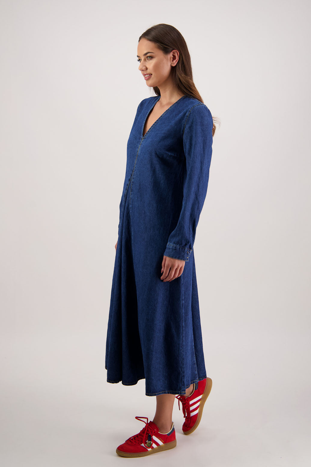 Roxie Denim Dress by Briarwood NZ. 100% cotton dress with V neck, full length sleeves with button closure, inset panel front & back