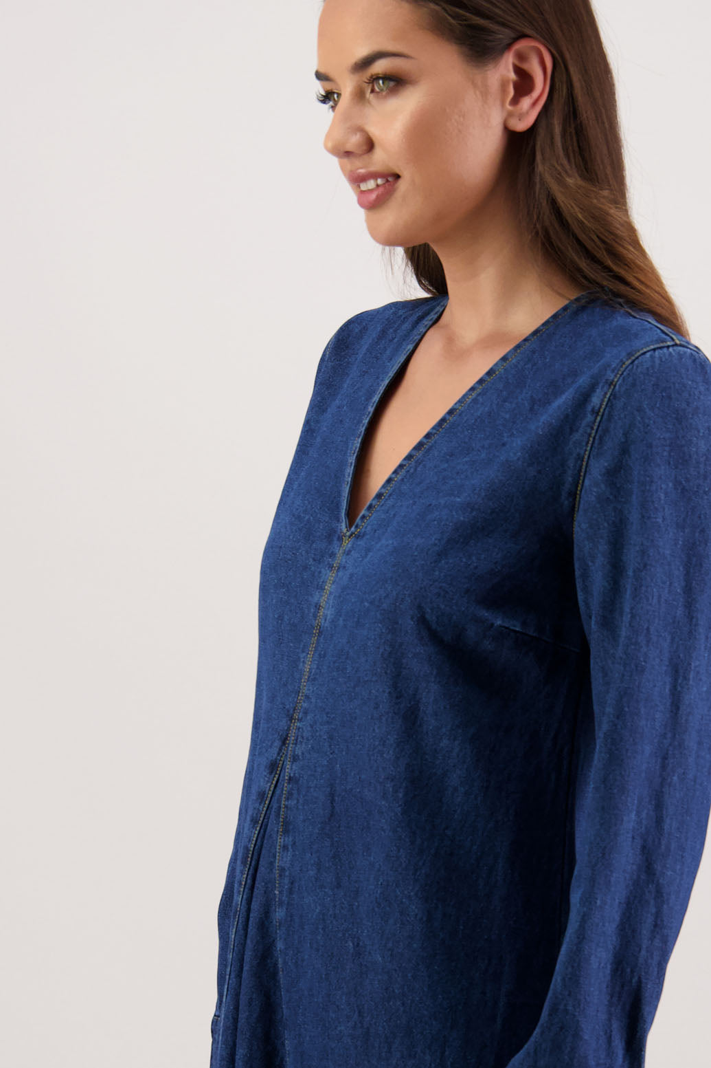 Roxie Denim Dress by Briarwood NZ. 100% cotton dress with V neck, full length sleeves with button closure, inset panel front & back