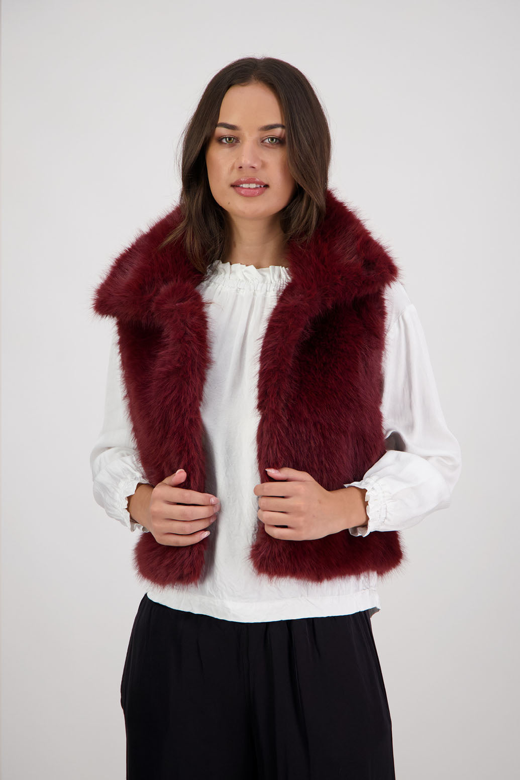 Royal Fluffy Vest in Red by Briarwood NZ. Fluffy faux fur polyester vest, collar, hook and eye closure, pockets