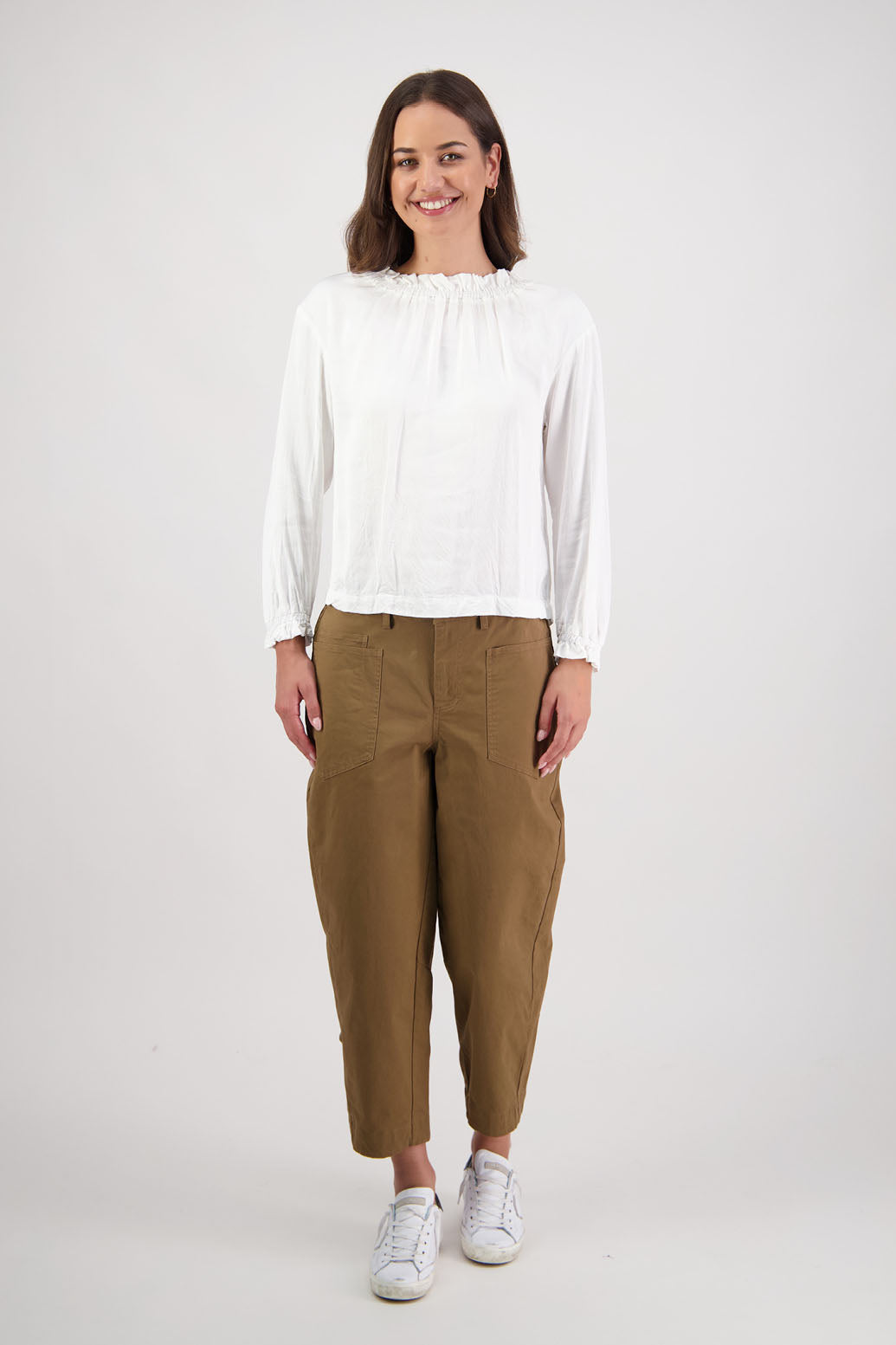 Ruby pant in Tan by Briarwood NZ. 97% Cotton pant with spandex. Slight barrel leg and cropped length, zip fly, elasticated through the back fro comfort, pockets front and back