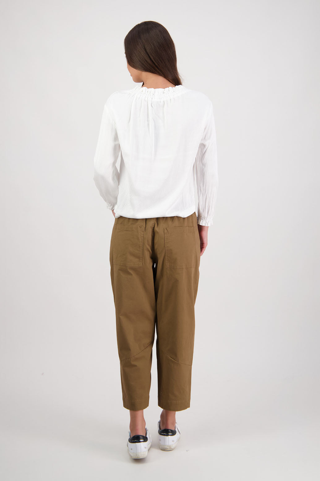 Ruby pant in Tan by Briarwood NZ. 97% Cotton pant with spandex. Slight barrel leg and cropped length, zip fly, elasticated through the back fro comfort, pockets front and back