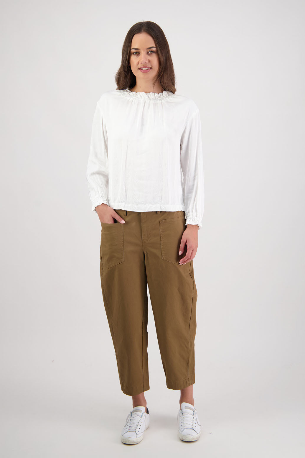 Ruby pant in Tan by Briarwood NZ. 97% Cotton pant with spandex. Slight barrel leg and cropped length, zip fly, elasticated through the back fro comfort, pockets front and back