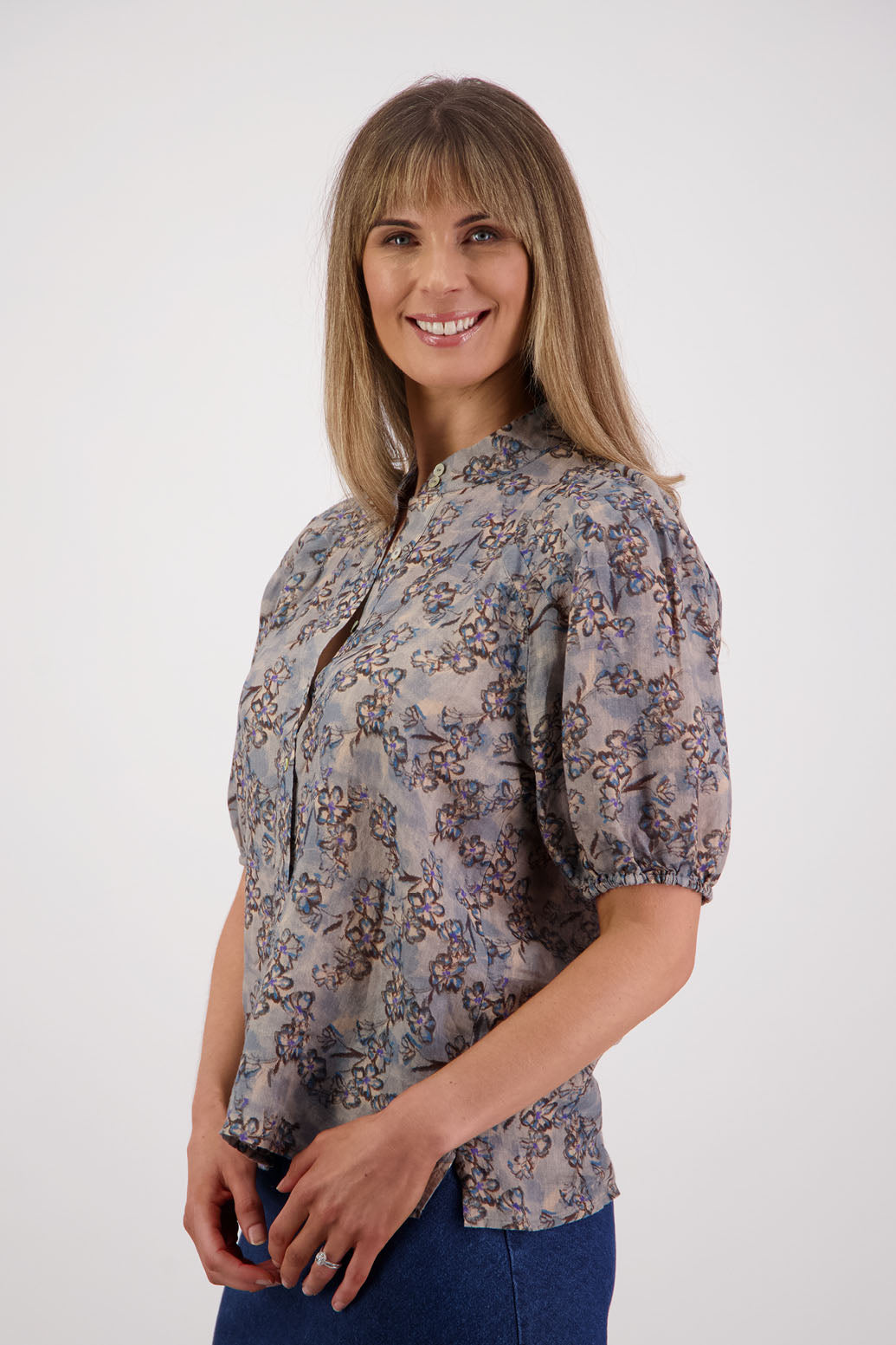 Womens Ramie shirt with pleats across the shoulders, soft puff elbow length sleeves and Grandpa collar. Briarwood NZ. Stevie, Denim Daisy print