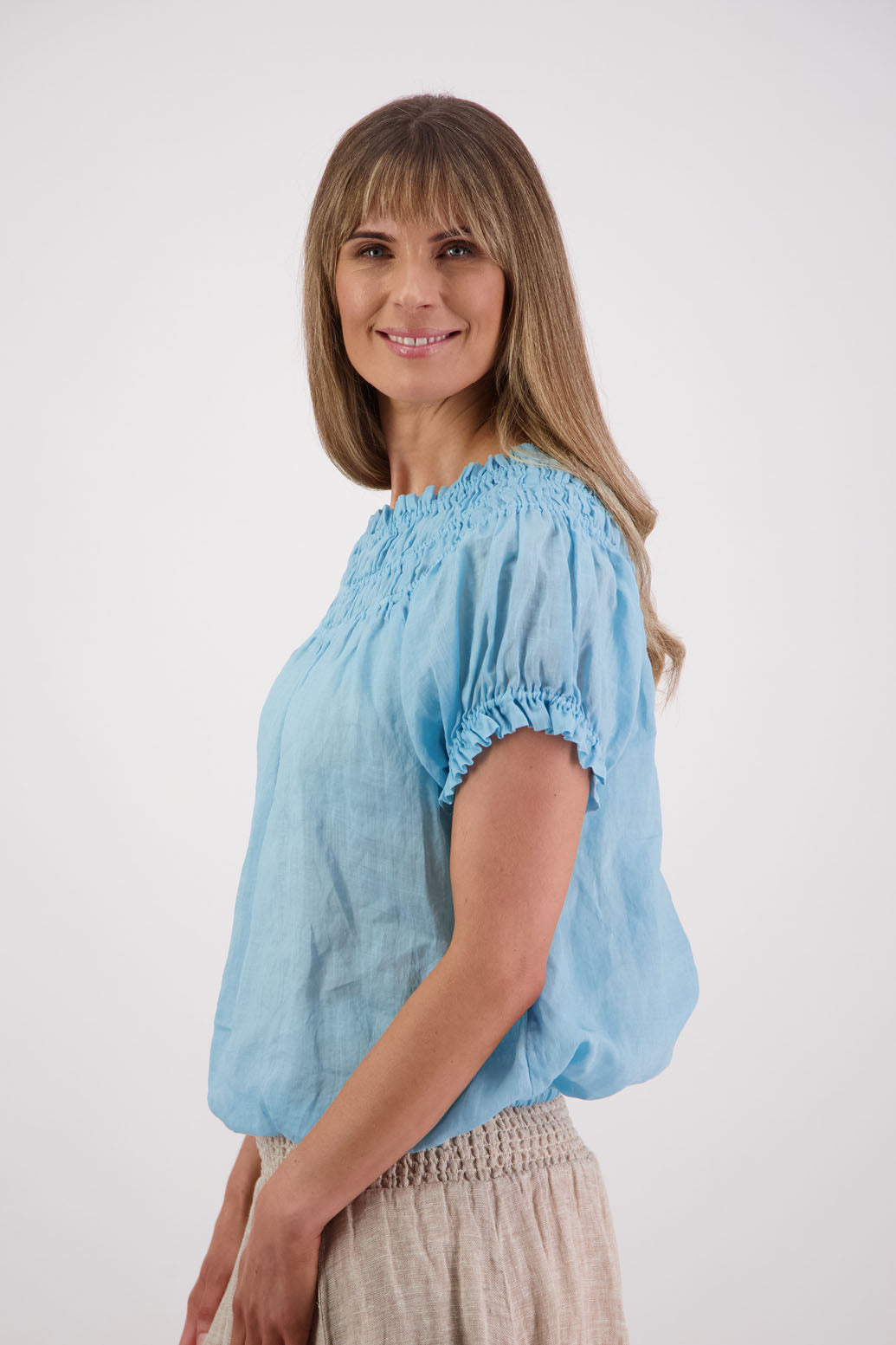 Womens top with shirred neck and ruffle sleeve. Briarwood NZ. Sal, Aqua, Ramie