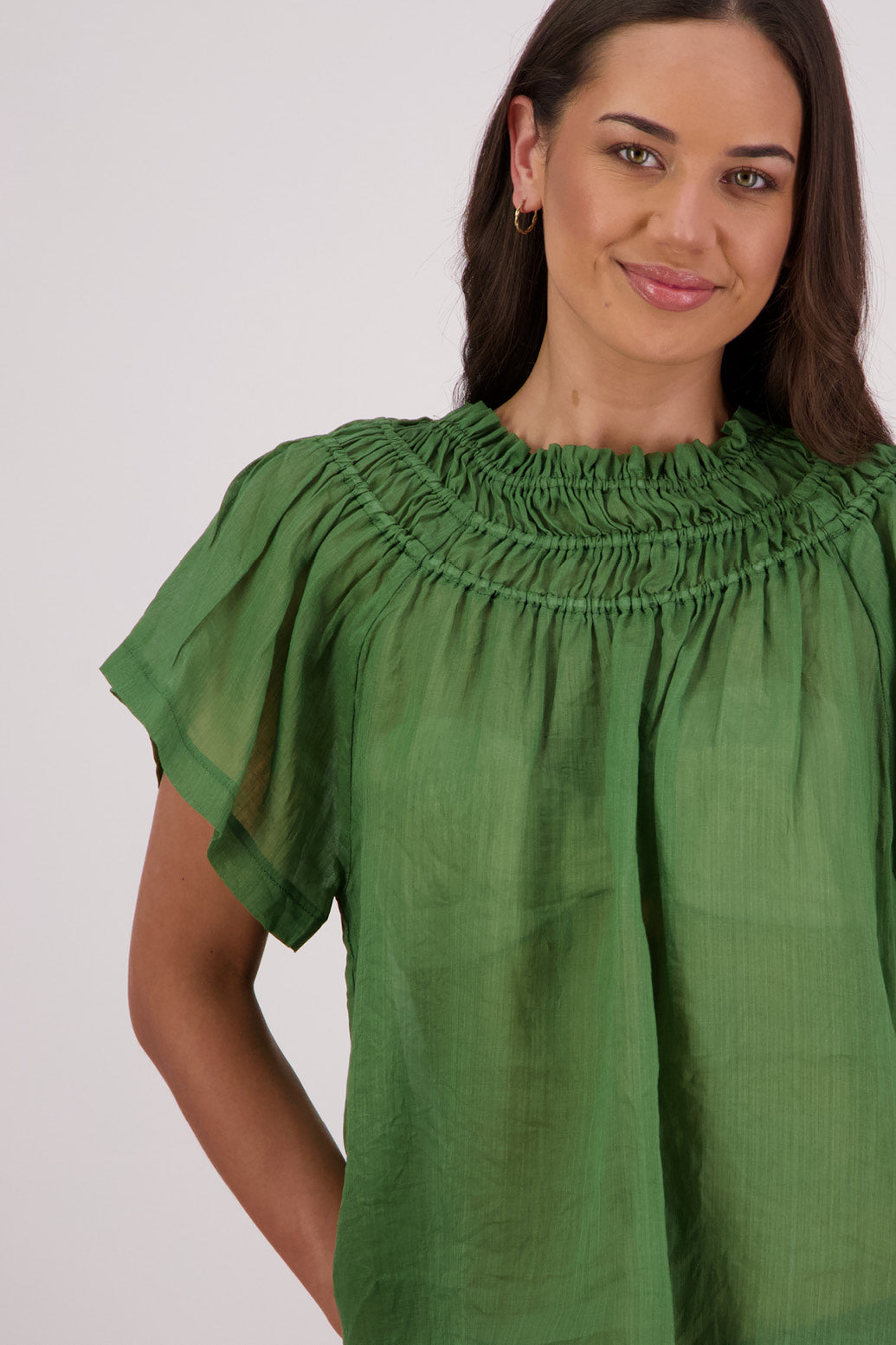 Closeup front view Briarwood Sally Top in Green.