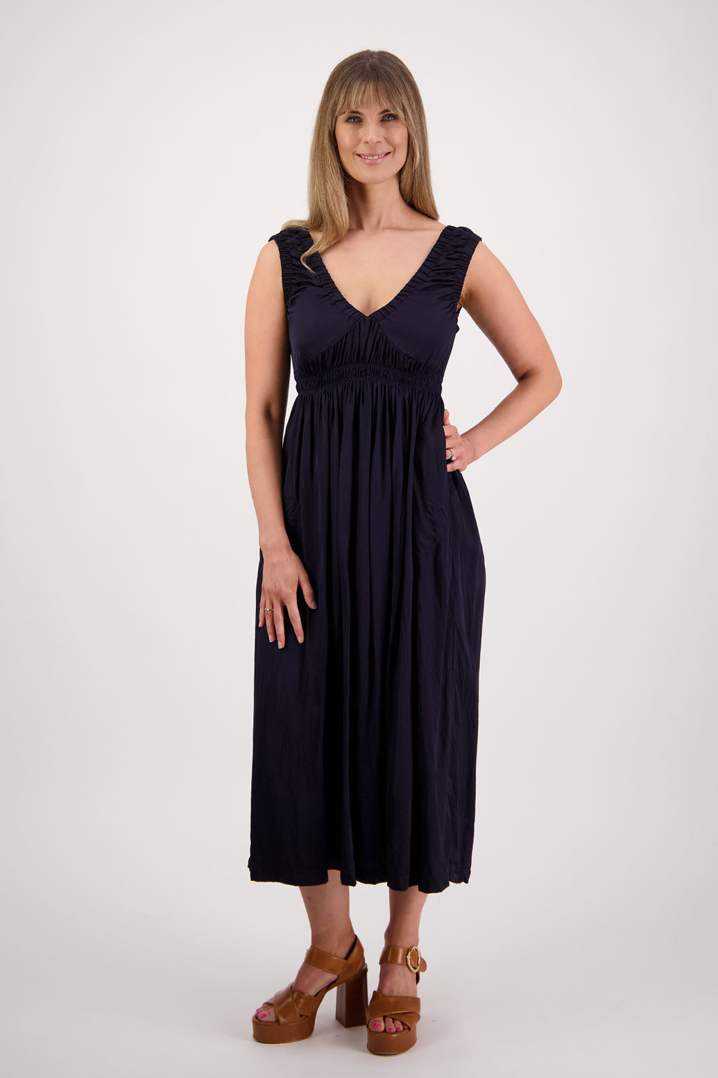 Womens long viscose ink dress. Sleeveless with v neck and gathered shoulders and the bust. Elastic waist and pockets. Briarwood NZ. Sapphire.