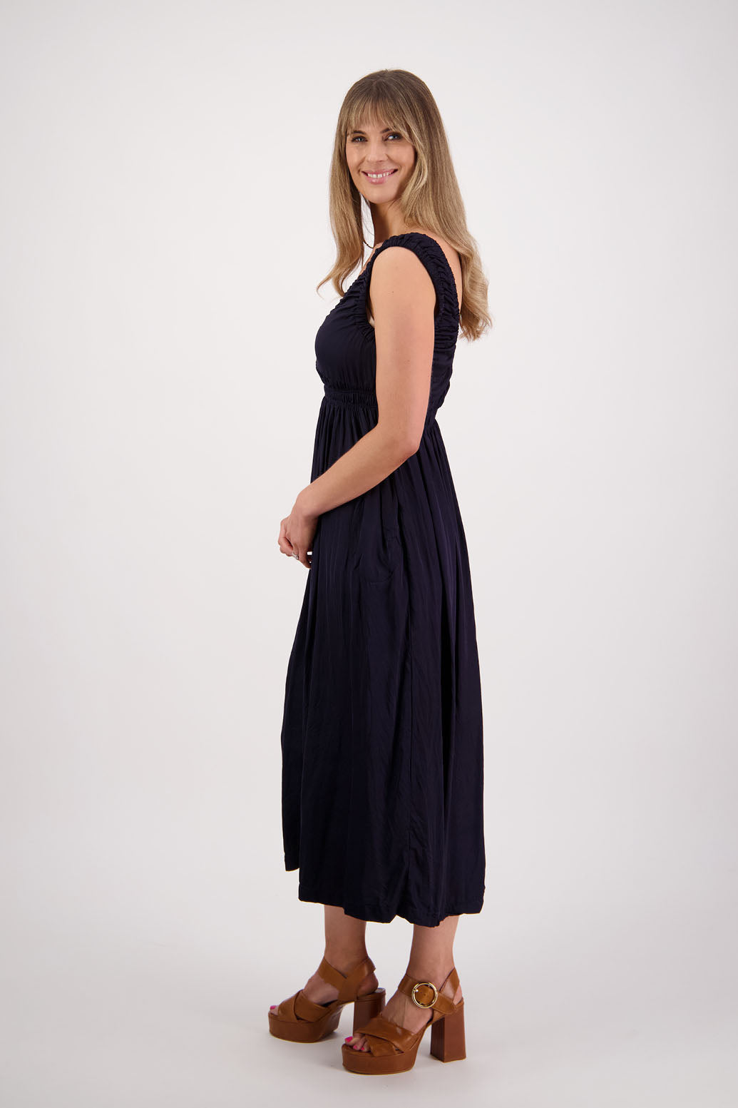 Womens long viscose ink dress. Sleeveless with v neck and gathered shoulders and the bust. Elastic waist and pockets. Briarwood NZ. Sapphire.