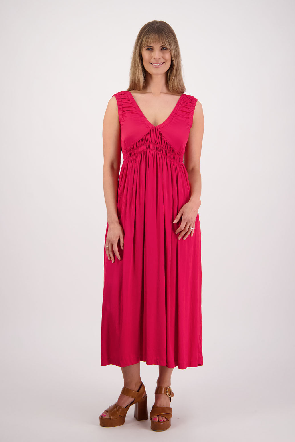 Womens long viscose red dress. Sleeveless with v neck and gathered shoulders and the bust. Elastic waist and pockets. Briarwood NZ. Sapphire.