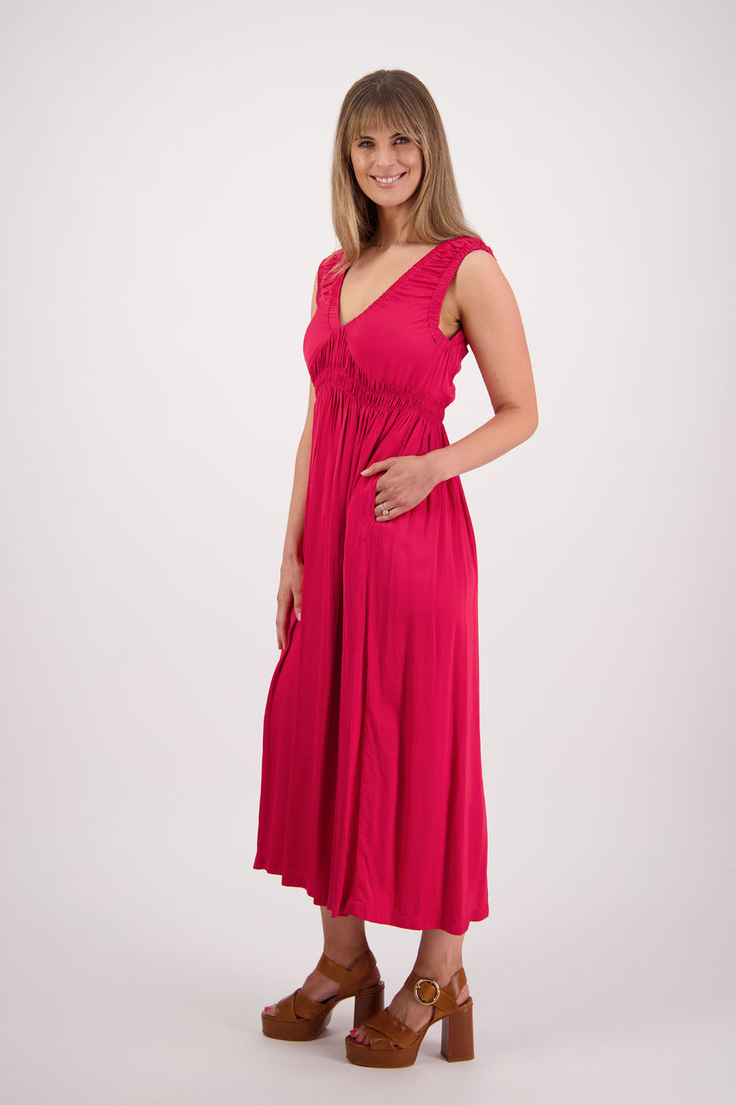 Womens long viscose red dress. Sleeveless with v neck and gathered shoulders and the bust. Elastic waist and pockets. Briarwood NZ. Sapphire.
