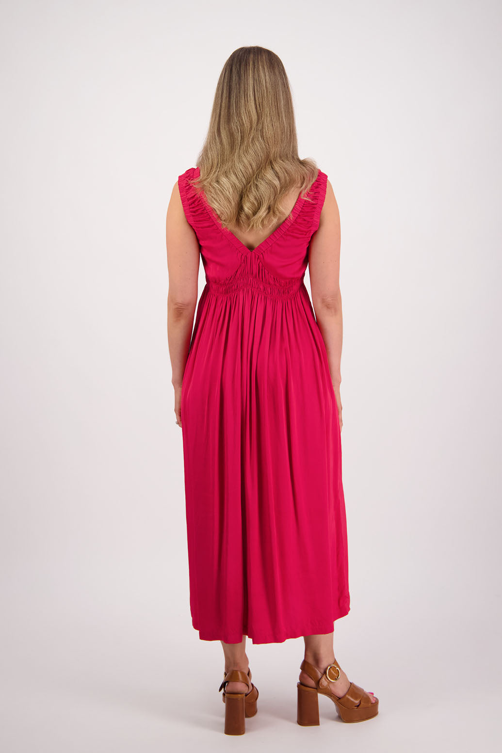 Womens long viscose red dress. Sleeveless with v neck and gathered shoulders and the bust. Elastic waist and pockets. Briarwood NZ. Sapphire.