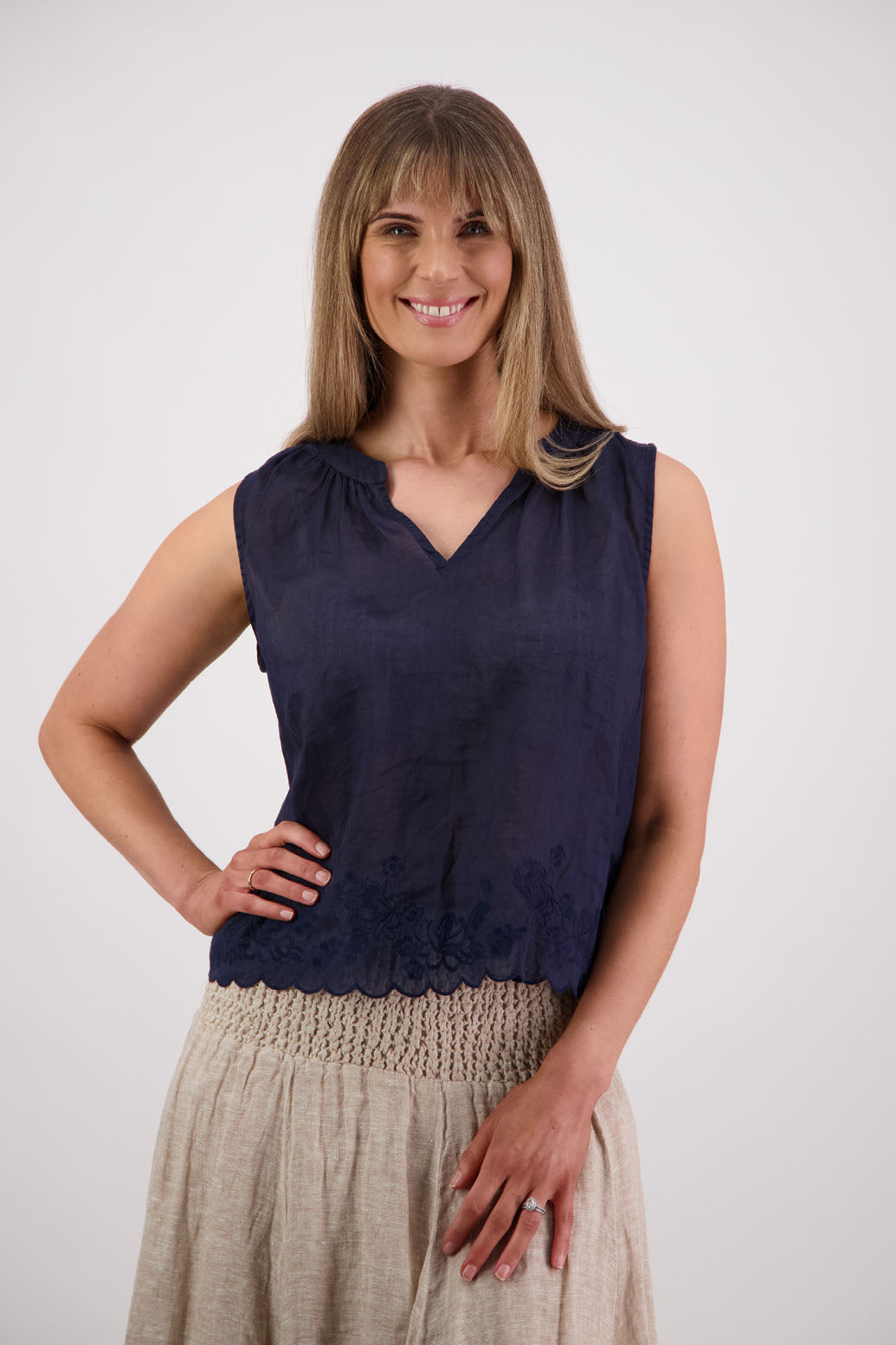 Briarwood NZ Sara Top. Ink, sleeveless, V neck, embroidered bottom