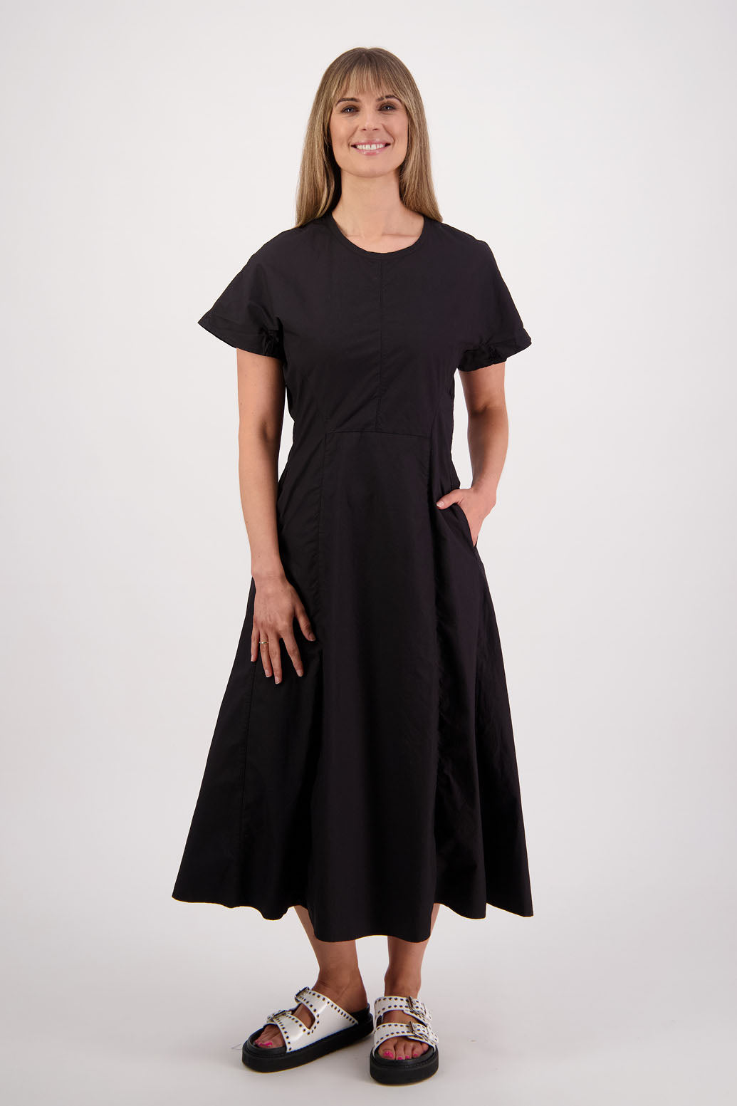 Womens shaped and waisted black dress with A-Line skirt, cap sleeves and zip up the back. Briarwood NZ. Cotton Poplin. Saunders