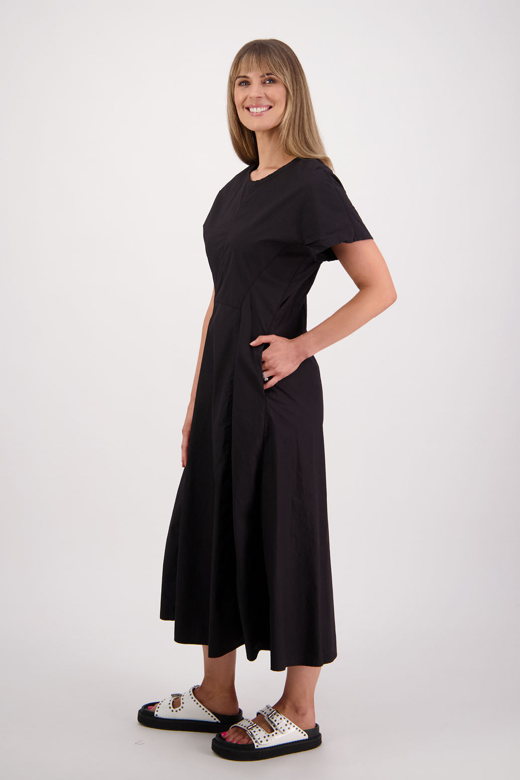 Womens shaped and waisted black dress with A-Line skirt, cap sleeves and zip up the back. Briarwood NZ. Cotton Poplin. Saunders