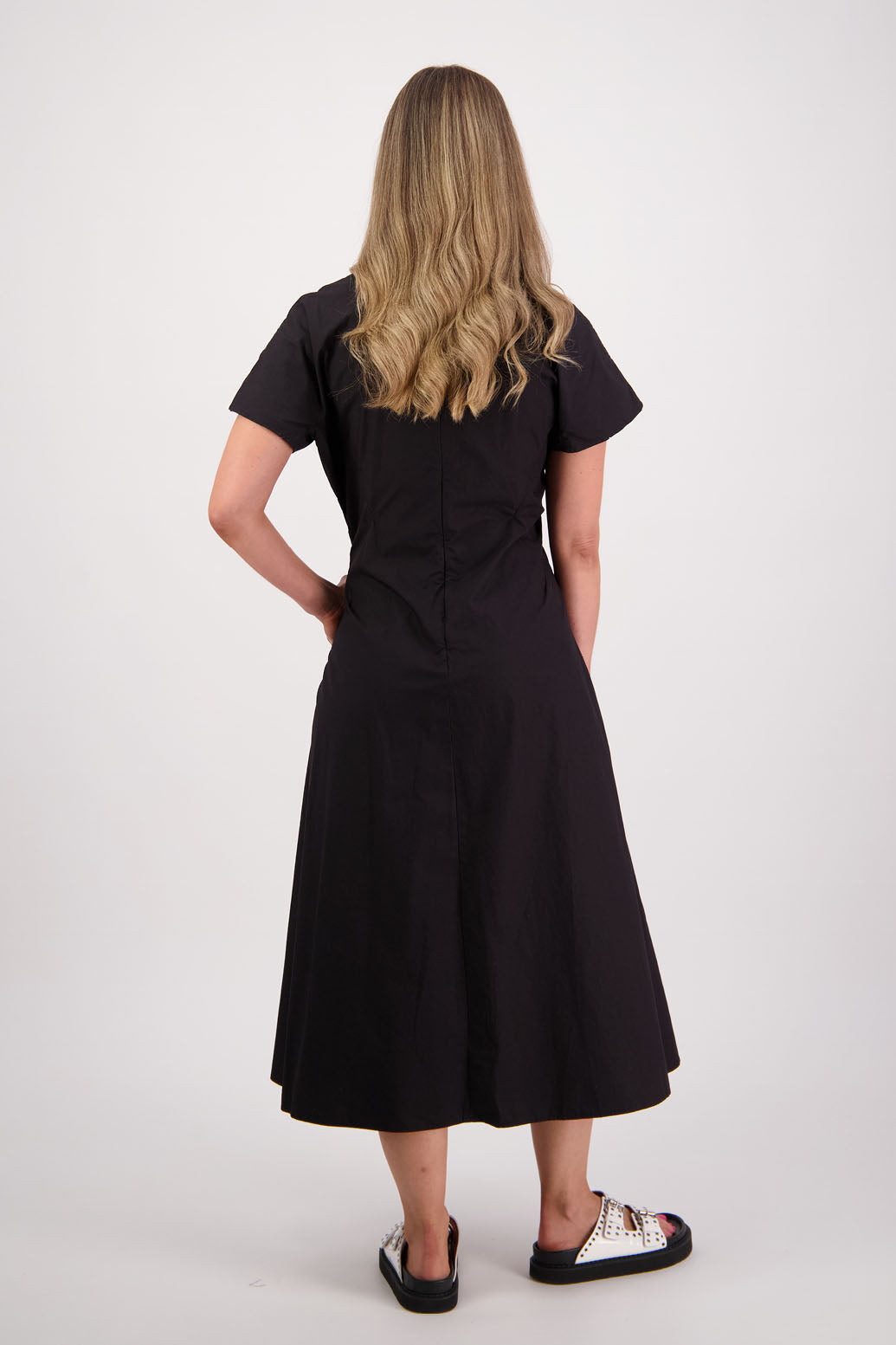 Womens shaped and waisted black dress with A-Line skirt, cap sleeves and zip up the back. Briarwood NZ. Cotton Poplin. Saunders